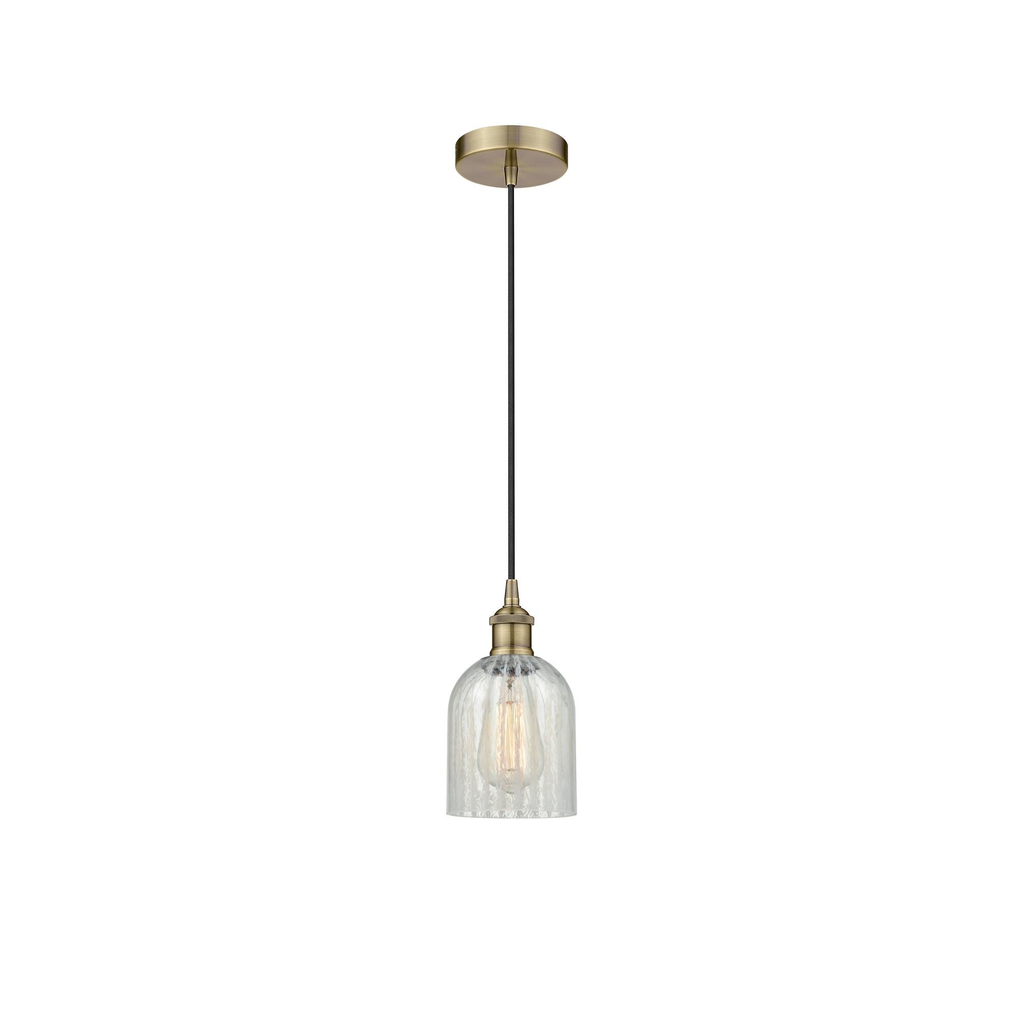 Shown in Antique Brass finish and Mouchette Caledonia glass