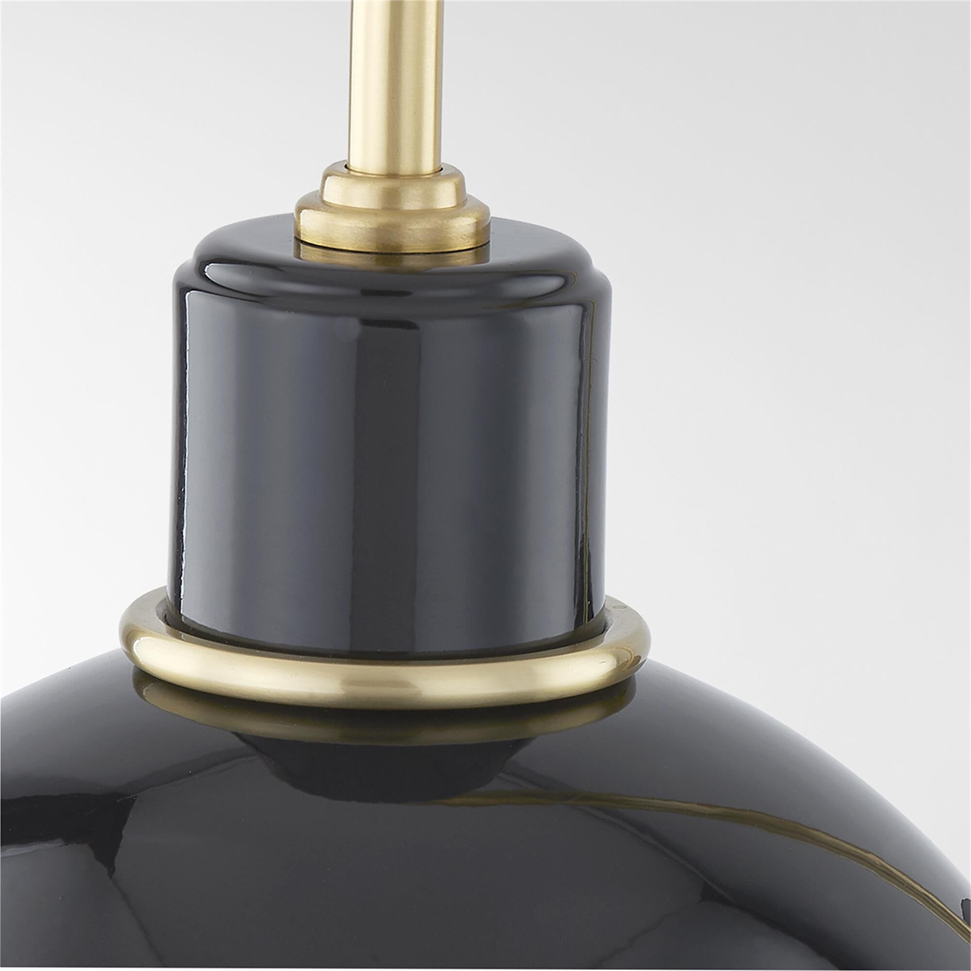 Shown in Aged Brass and Glossy Black finish and Metal shade