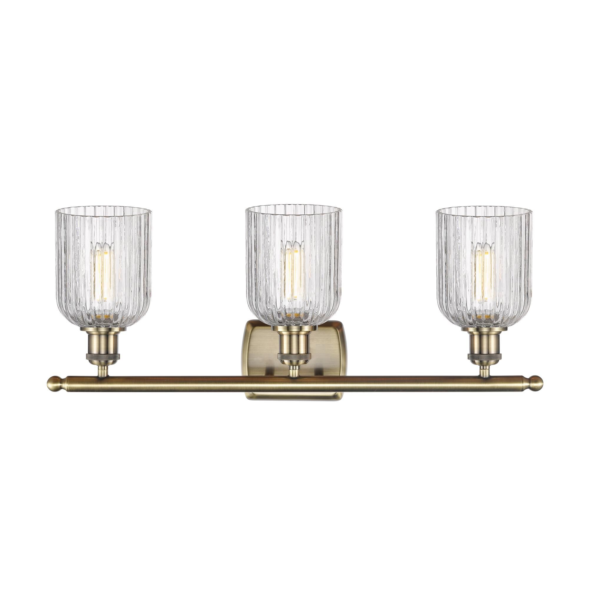 Shown in Antique Brass finish and Clear glass