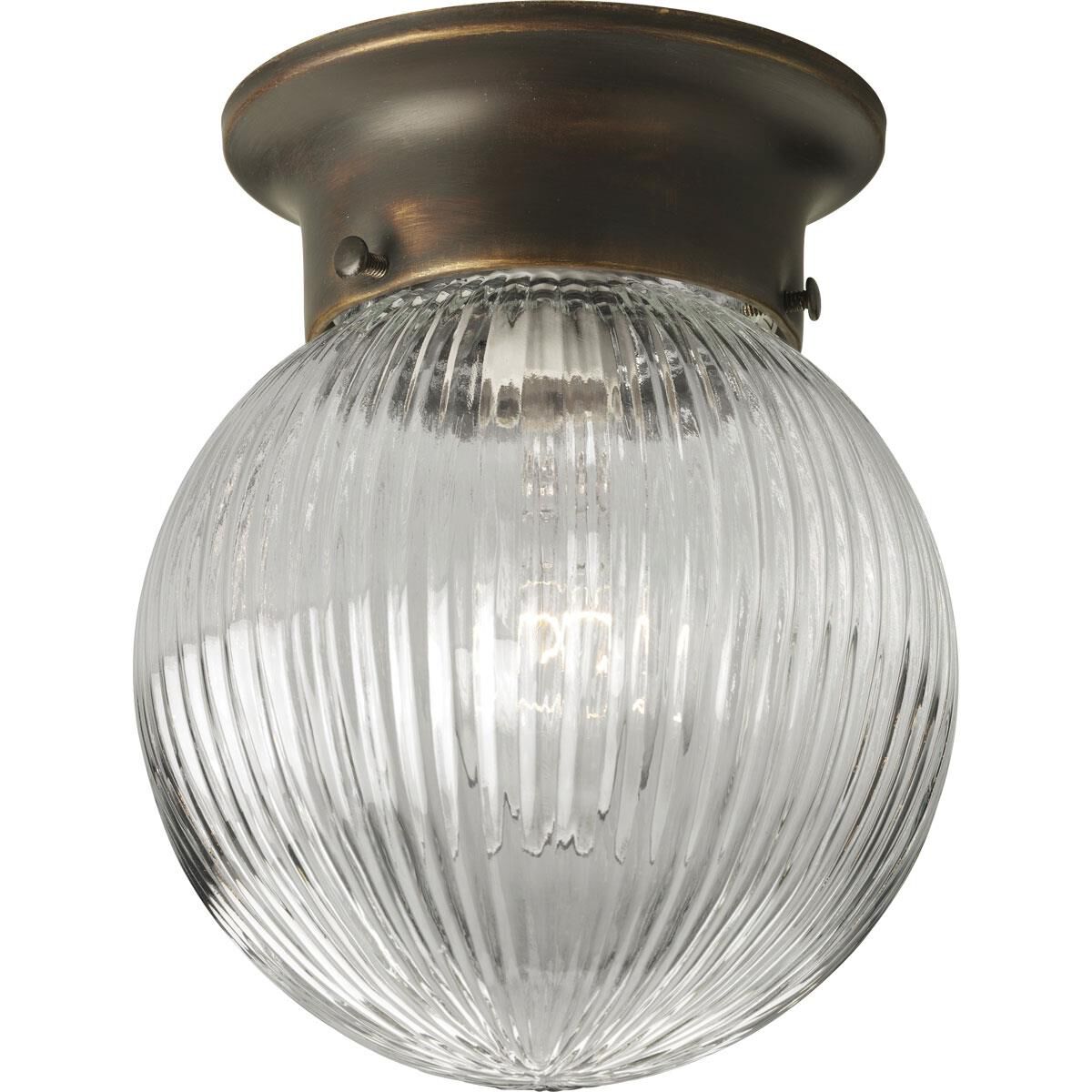 Shown in Antique Bronze finish and Clear Ribbed glass