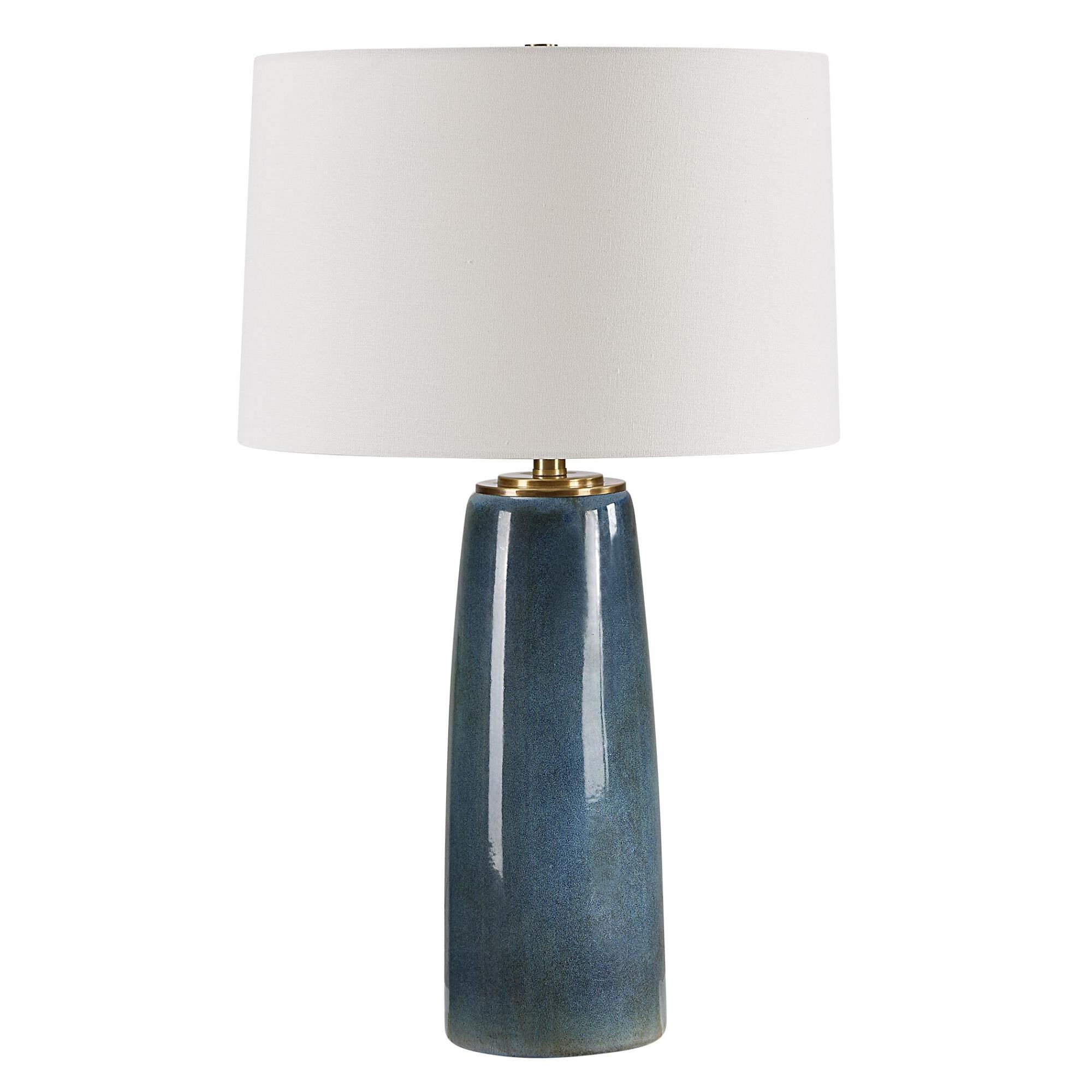 Shown in This Ceramic Table Lamp Showcases A Deep Blue Glaze With Rustic Undertones, Accented With Plated Ant finish and Round Hardback shade