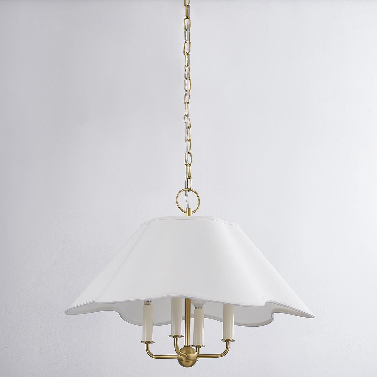 Shown in Aged Brass finish and White Linen shade