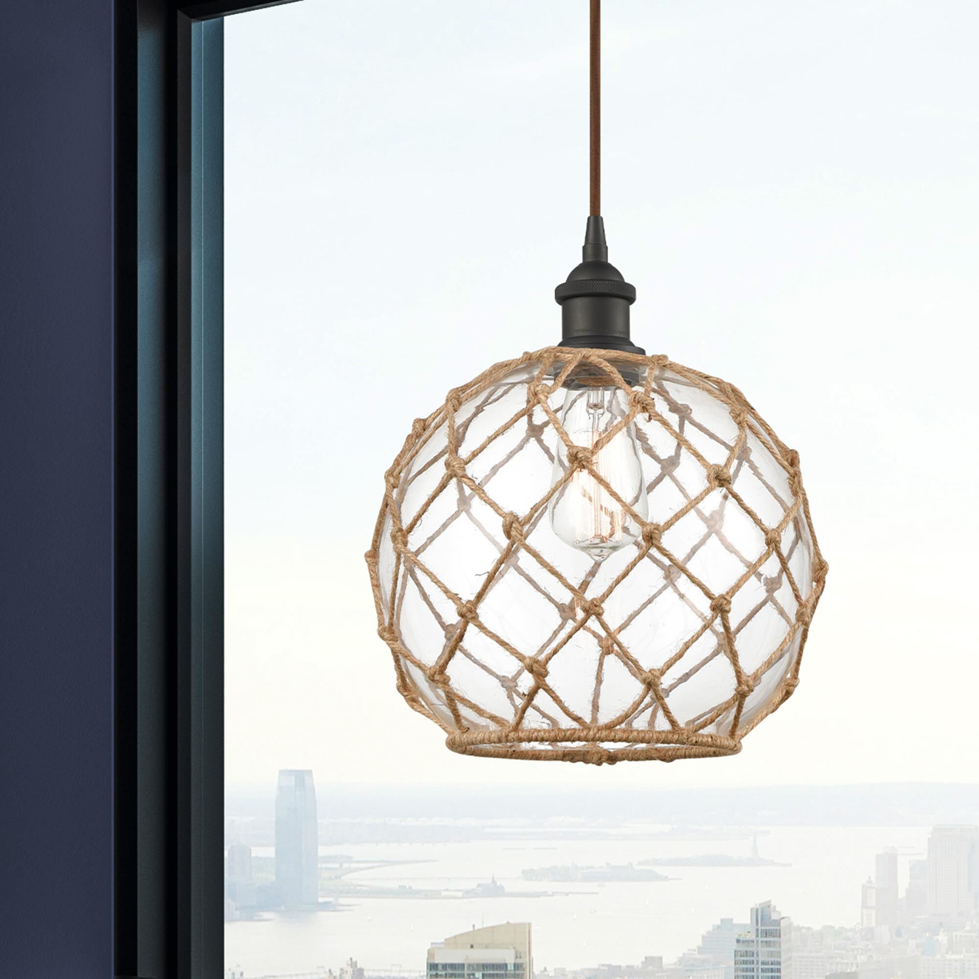 Shown in Oil Rubbed Bronze finish and Clear With Black Rope glass
