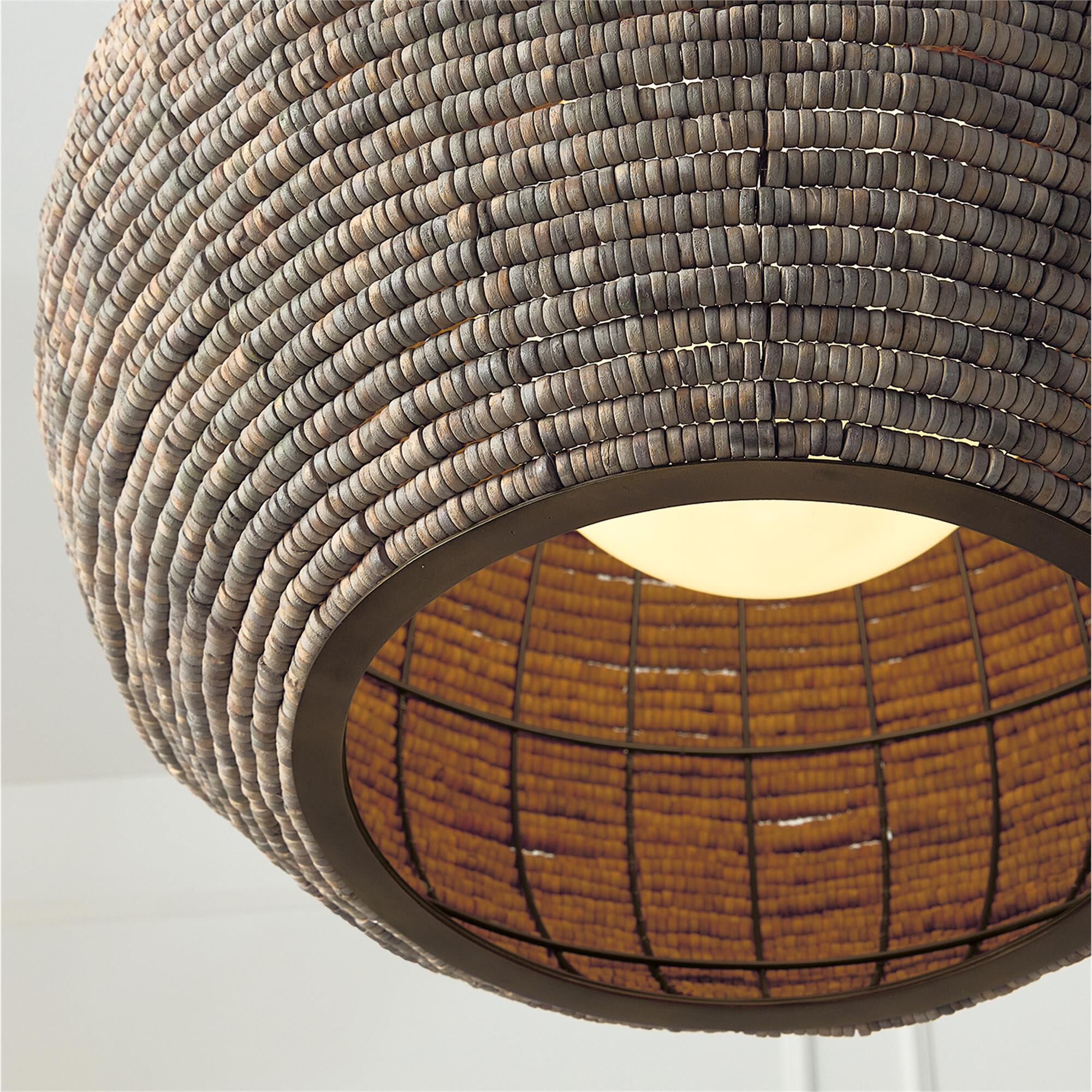 Shown in Aegean Grey And Dark Brass finish and White  Globe glass