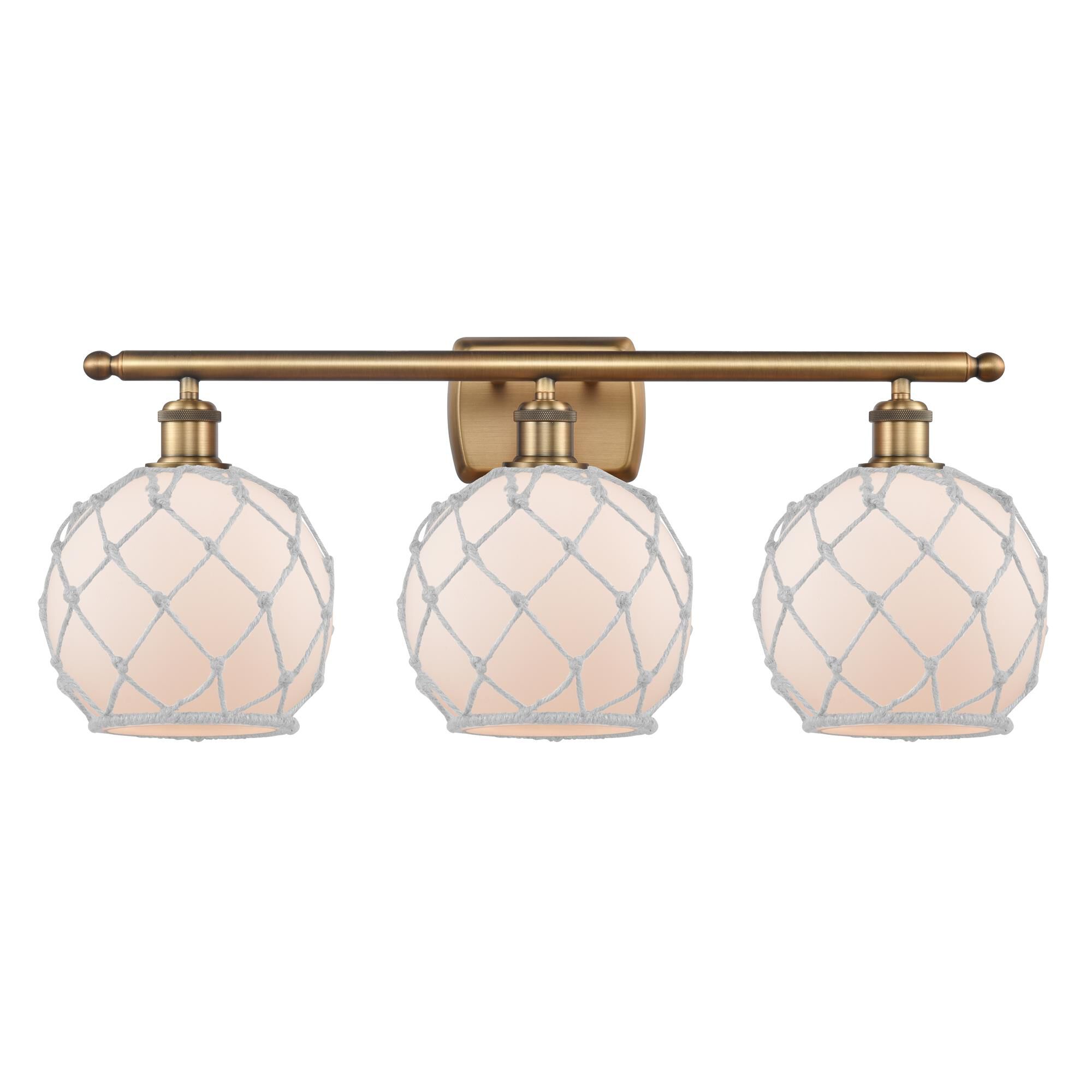 Shown in Brushed Brass finish and Sphere glass and Glass And Rope shade and Polished Chrome accent