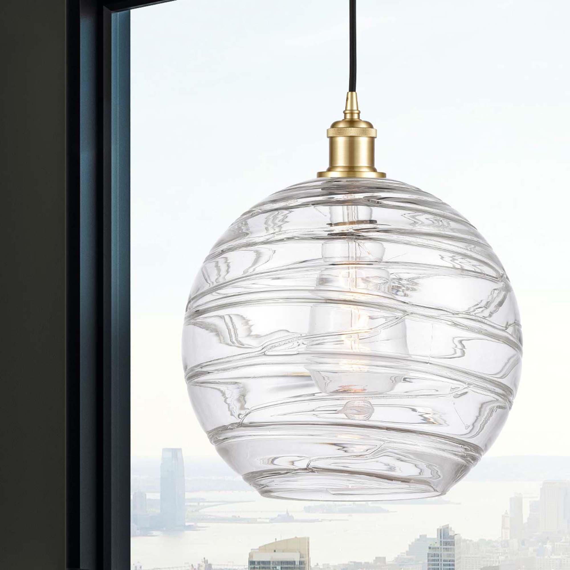 Shown in Satin Gold finish and Transparent Deco Swirl glass