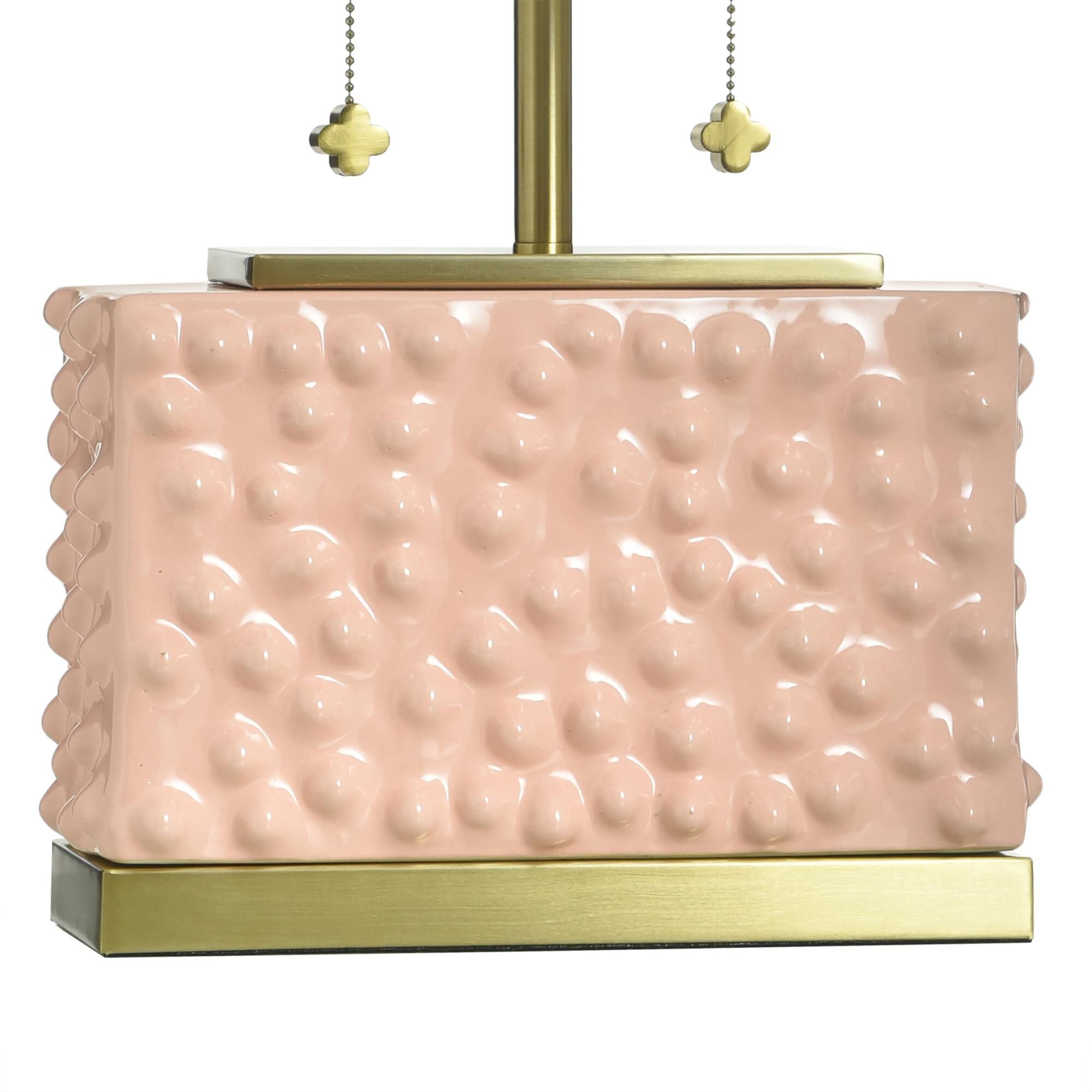 Shown in Pearl Blush and Polished Brass finish and Off-White shade