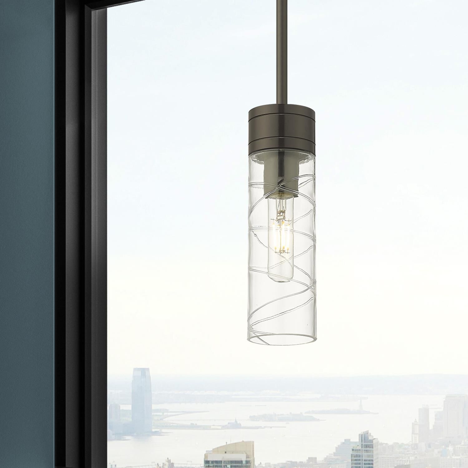 Shown in Oil Rubbed Bronze finish and Deco Swirl glass