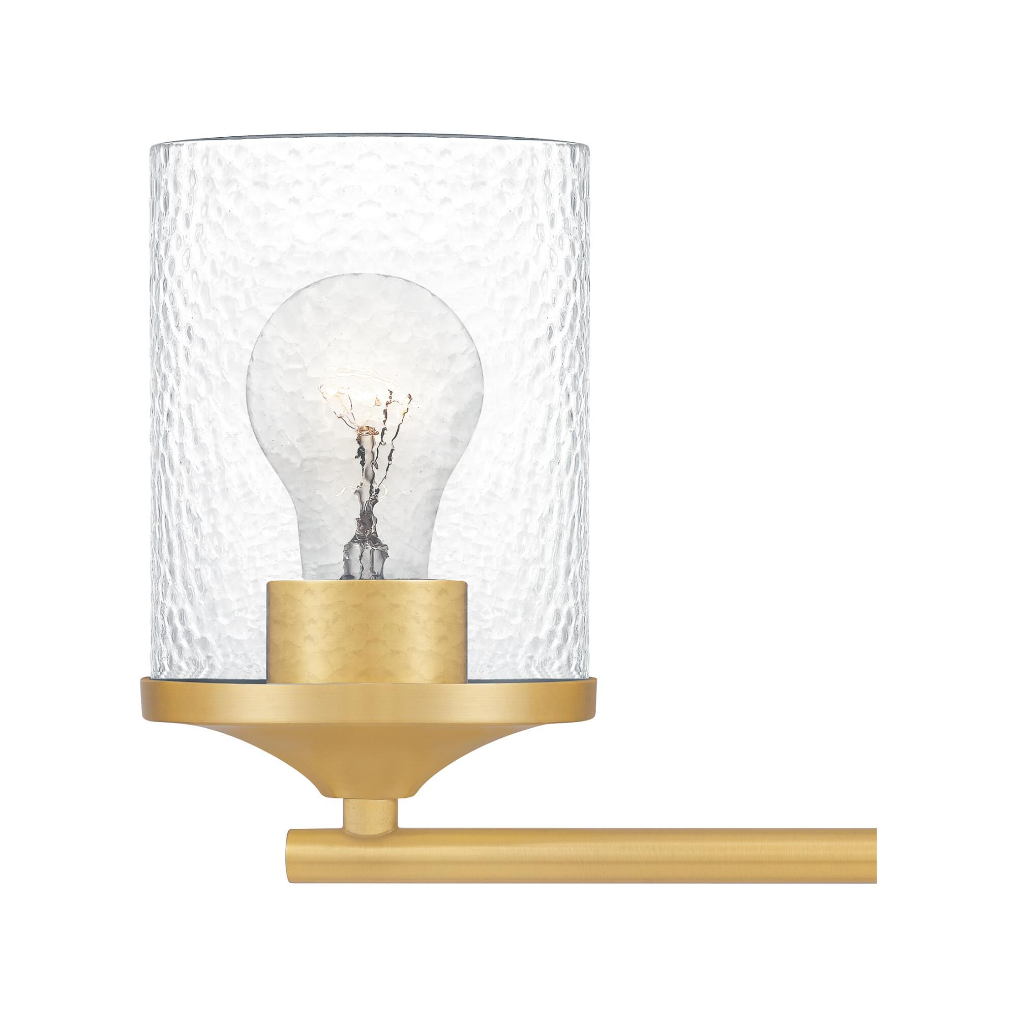 Shown in Aged Brass finish and Clear Hammered Glass shade