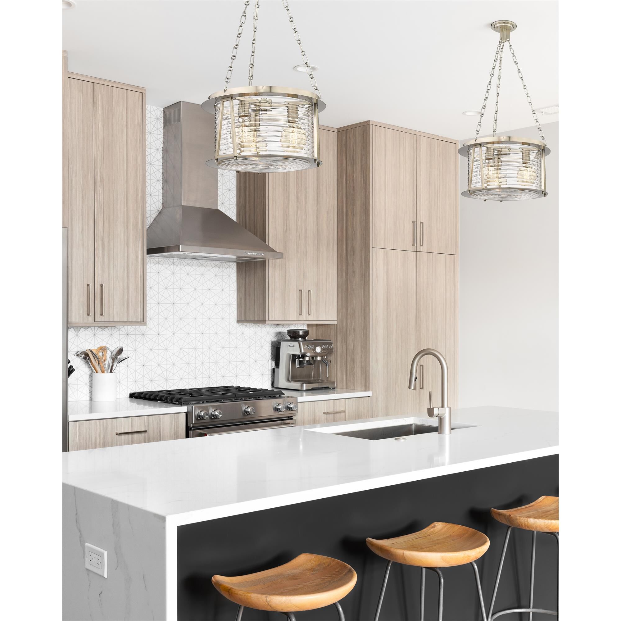 Shown in Brushed Nickel finish and Water Hammered glass