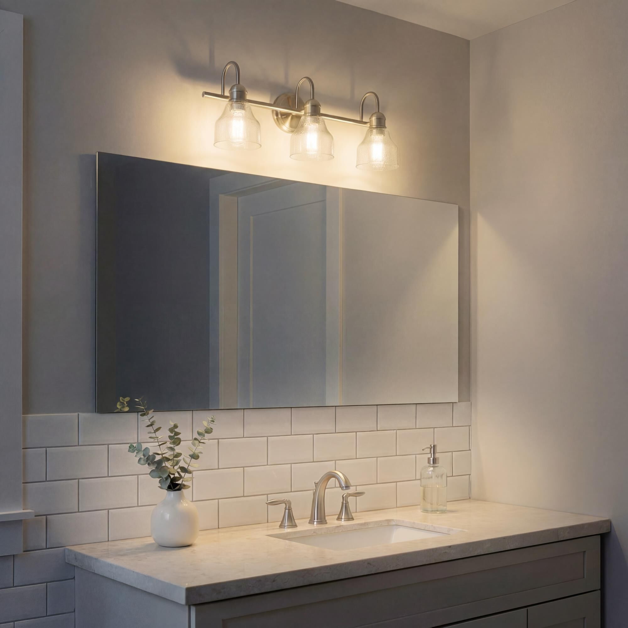 Shown in Brushed Nickel finish and Clear Seeded glass