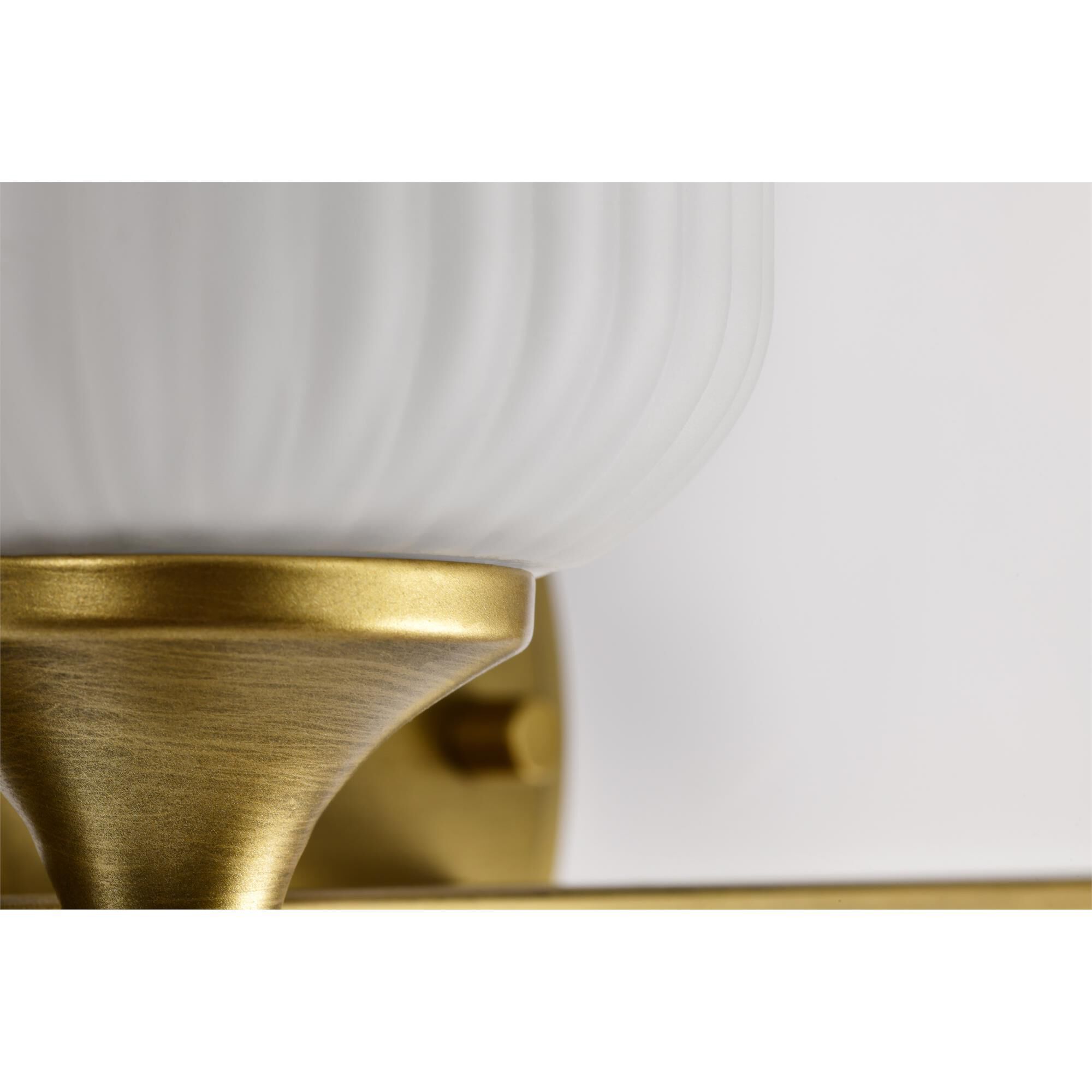 Shown in Natural Brass finish and Frosted Ribbed glass