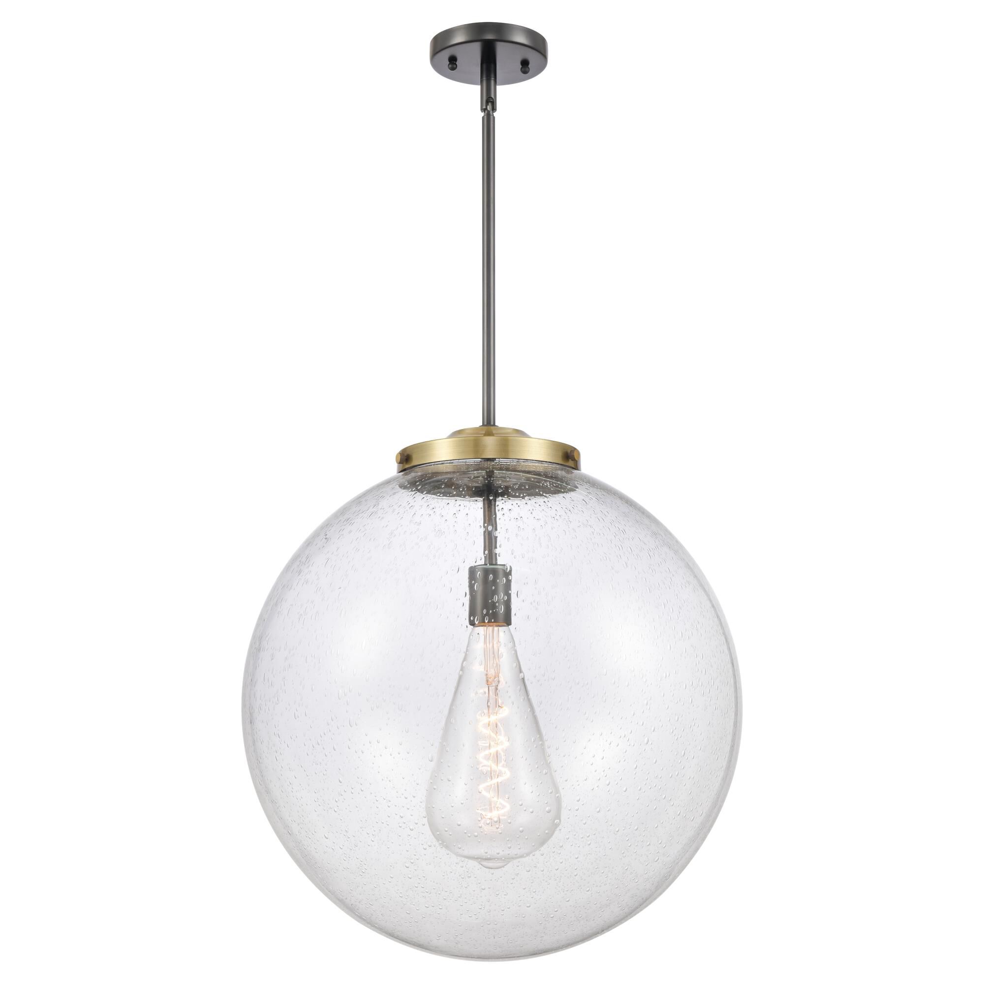 Shown in Black Antique Brass finish and Seedy Beacon glass