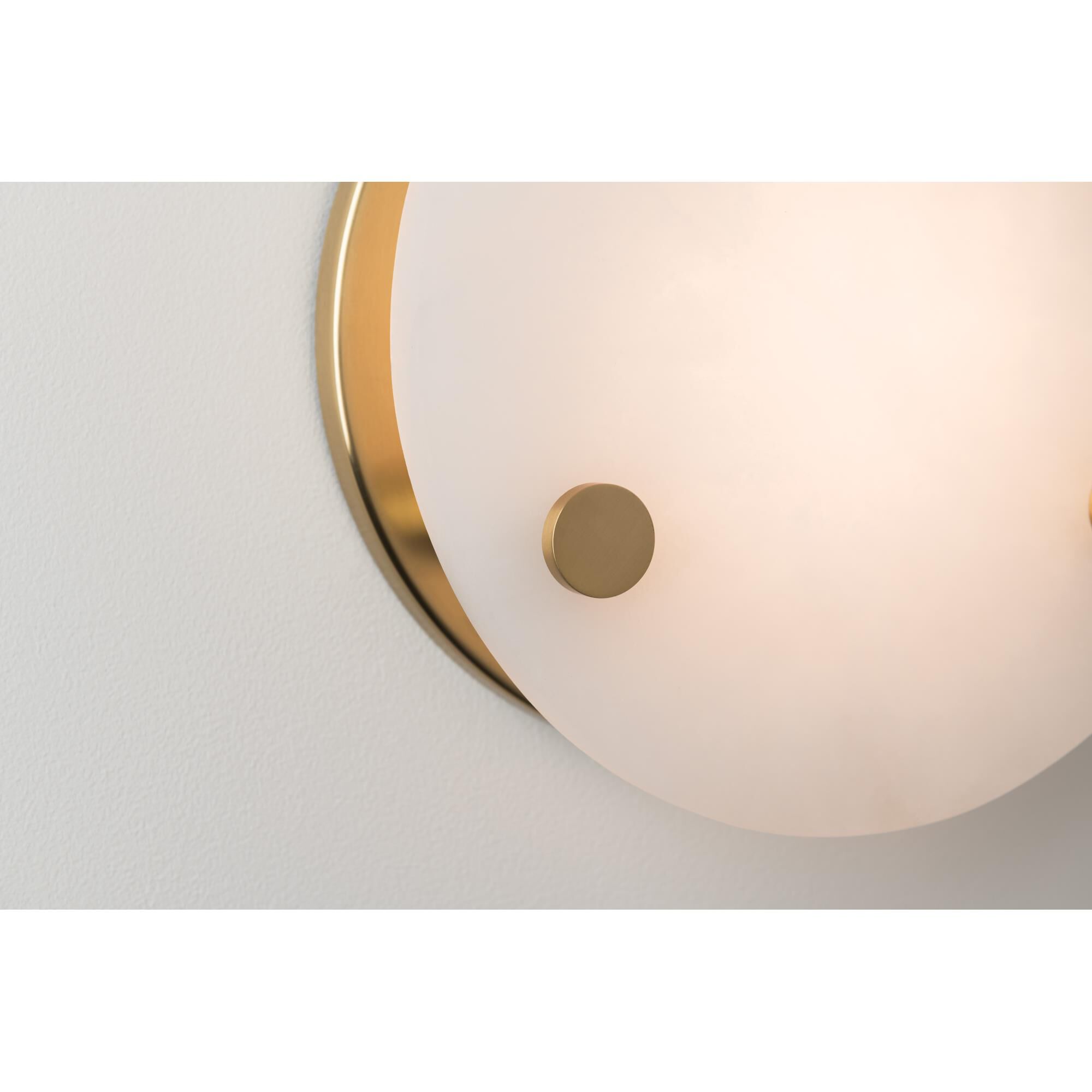 Shown in Aged Brass finish and White Alabaster glass