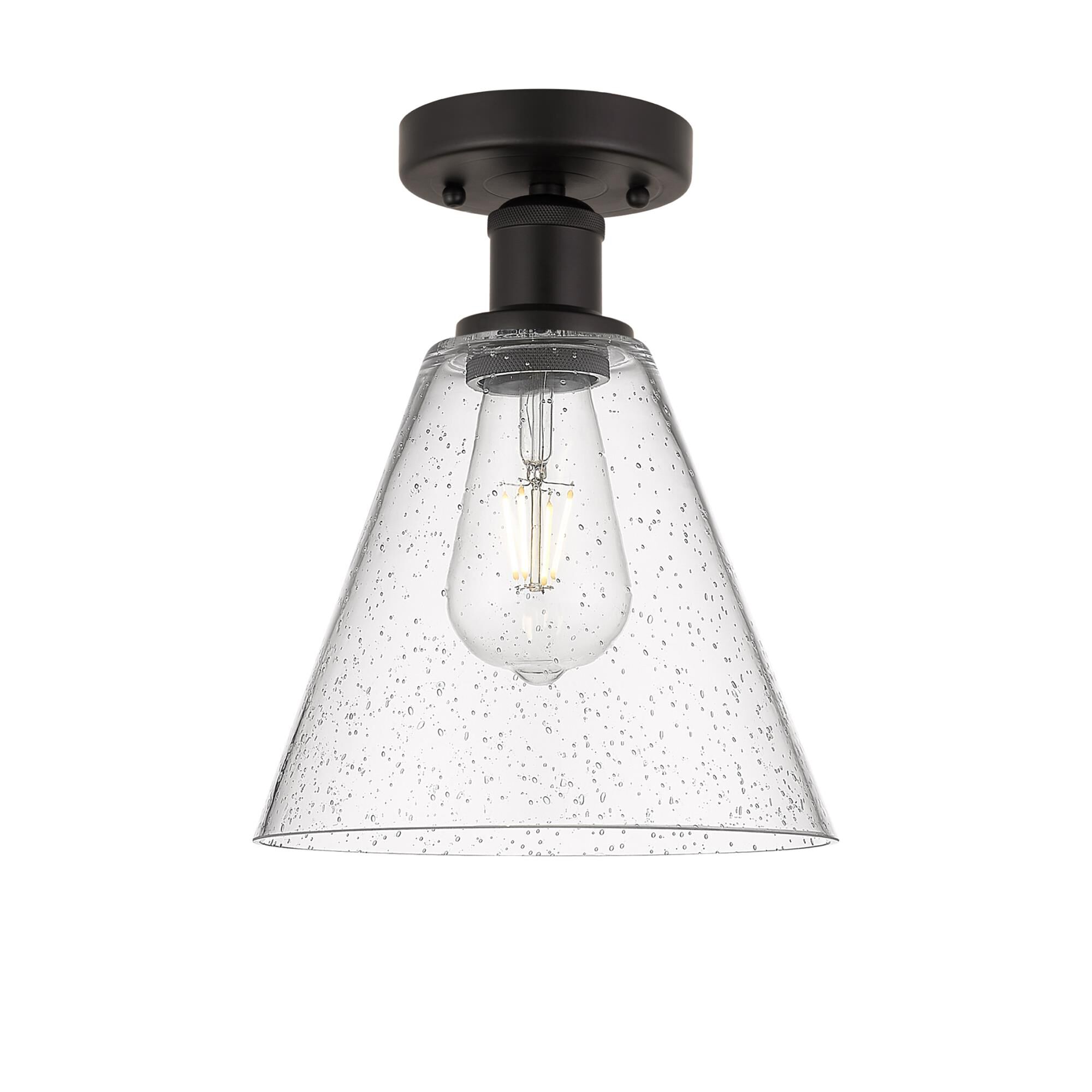 Shown in Oil Rubbed Bronze finish and Seedy glass