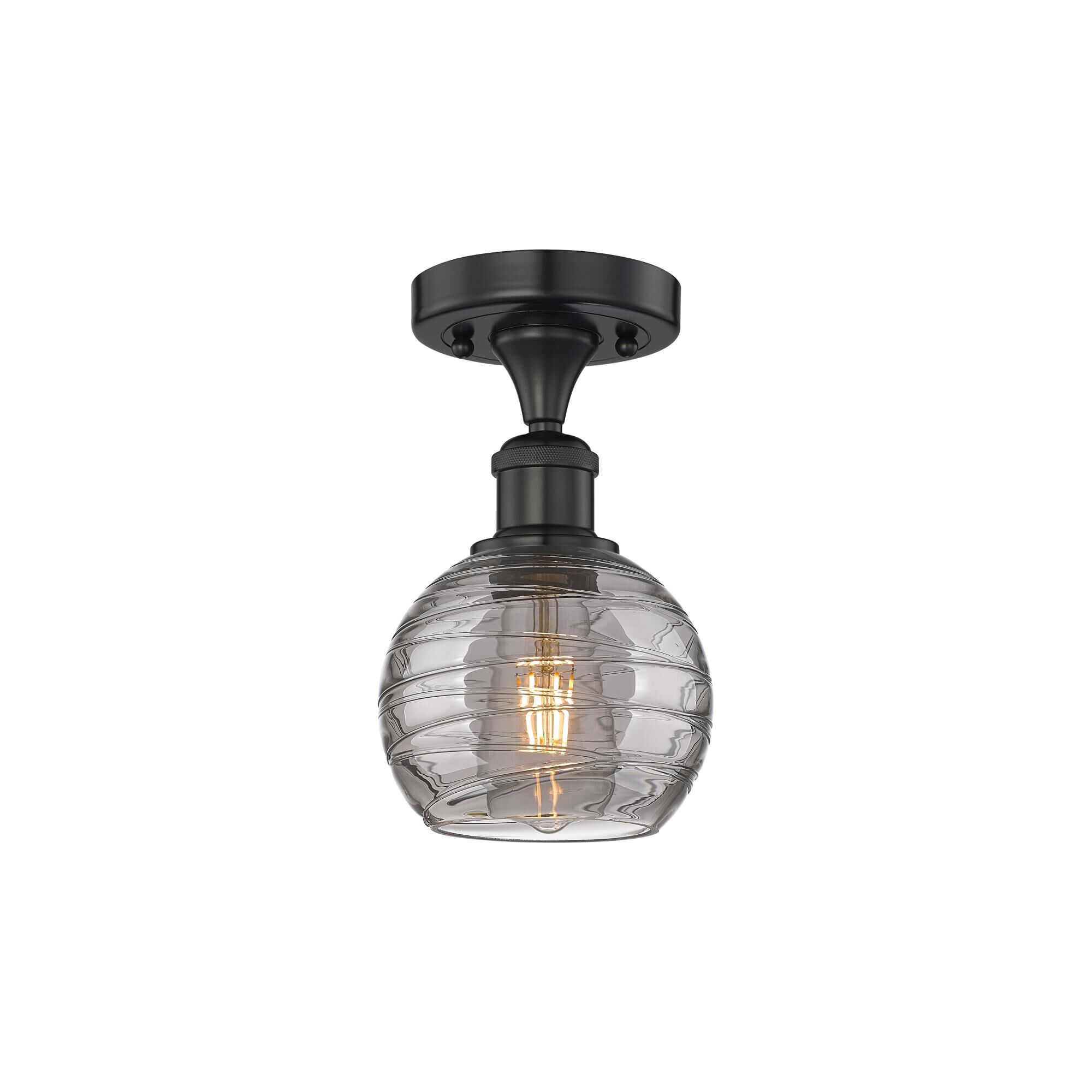 Shown in Matte Black finish and Light Smoke Deco Swirl glass