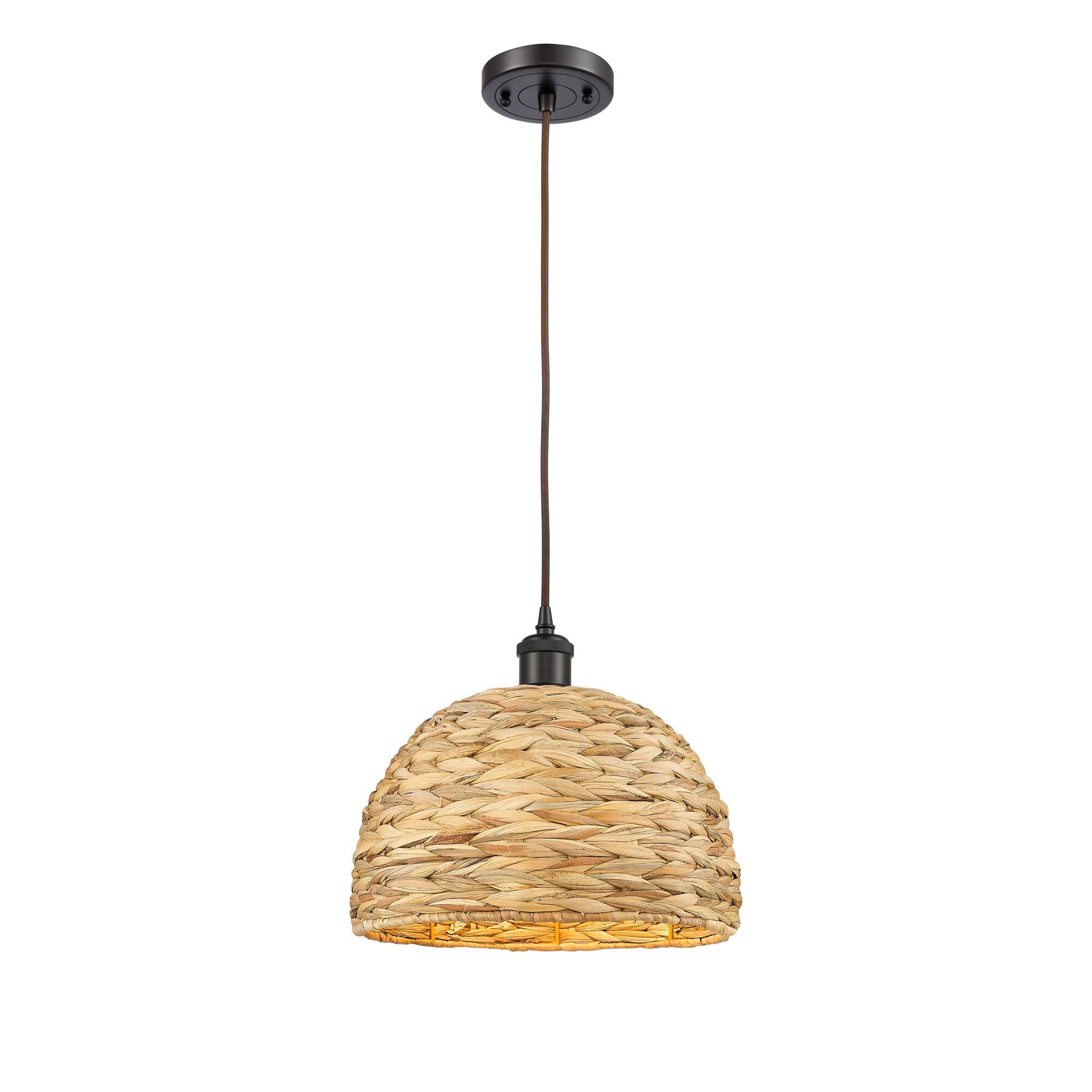 Shown in Oiled Brass finish and Natural Rattan Rattan shade