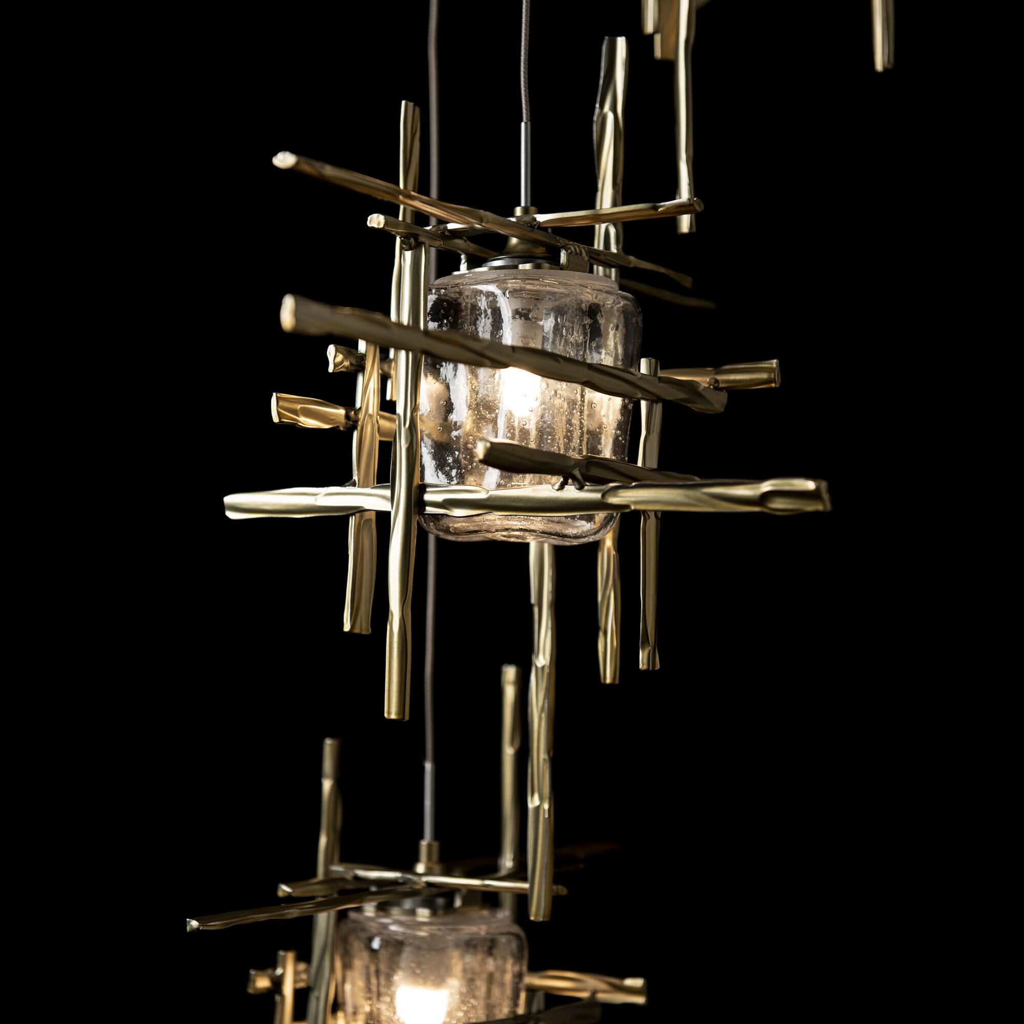 Shown in Modern Brass finish and Seeded Clear glass and Seeded Clear Glass shade