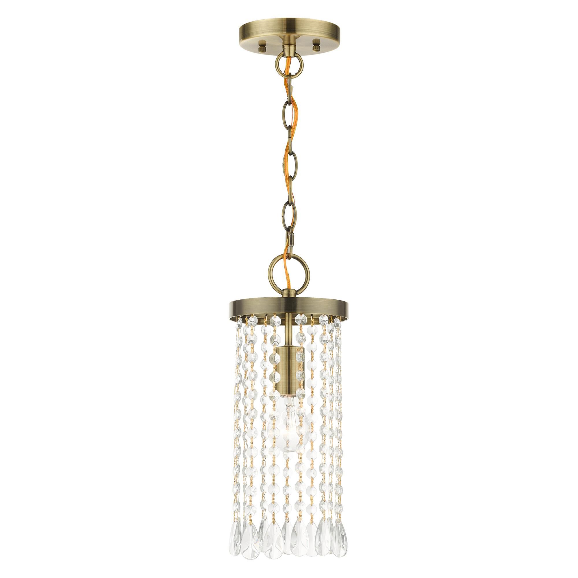 Shown in Antique Brass finish and Hand Assembled Crystal Shade glass