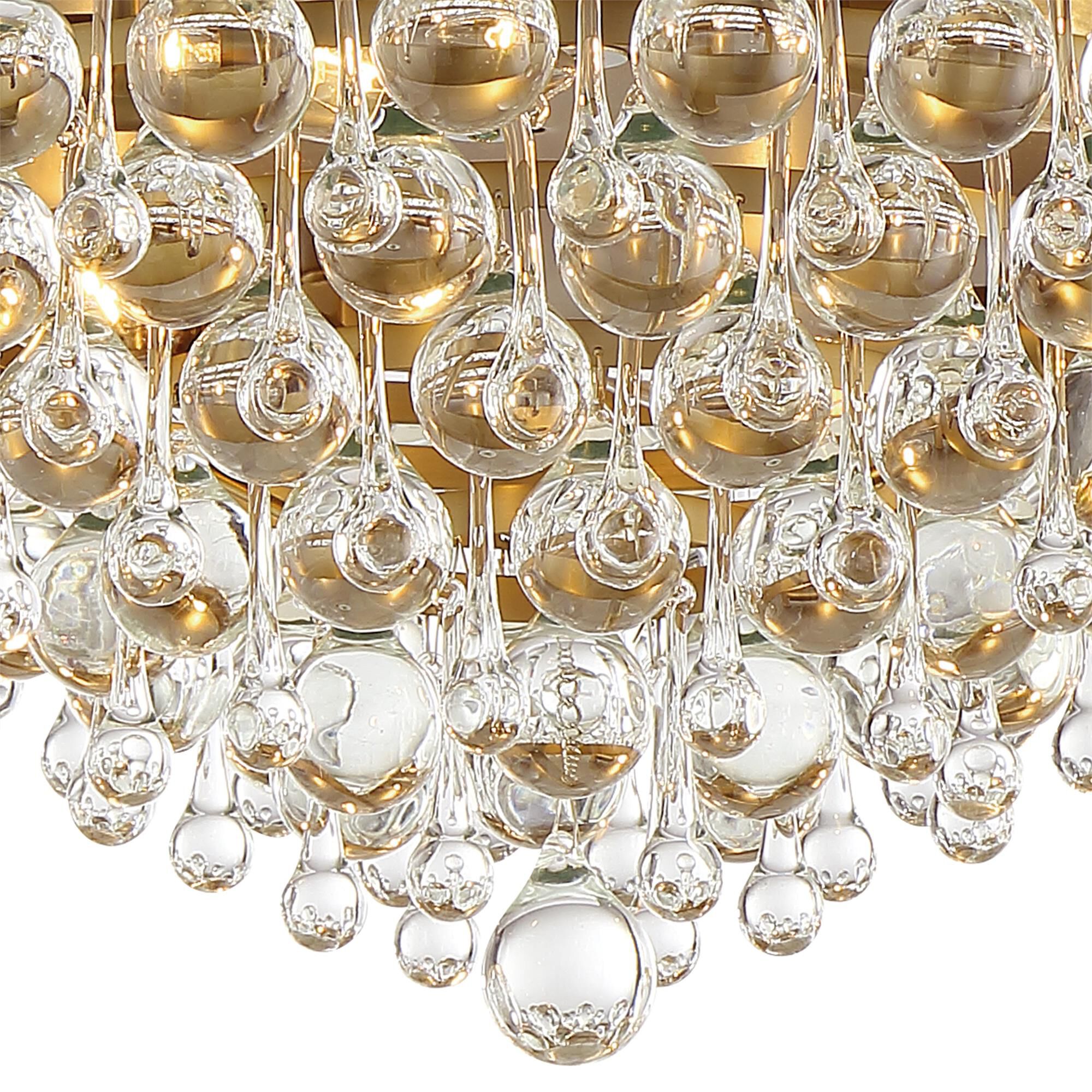 Shown in Vibrant Gold finish and Clear Glass Drops crystal