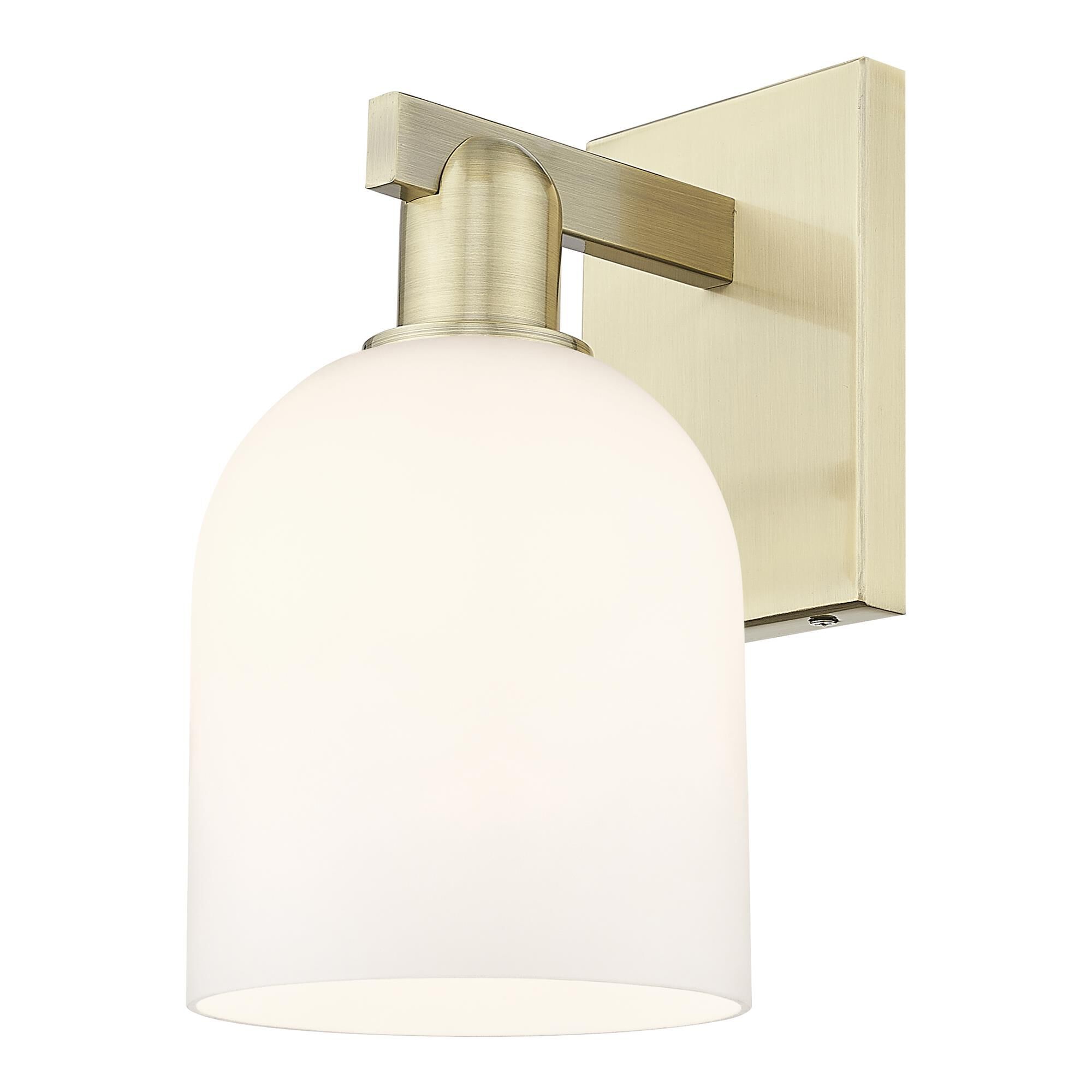 Shown in Antique Brass finish and White glass