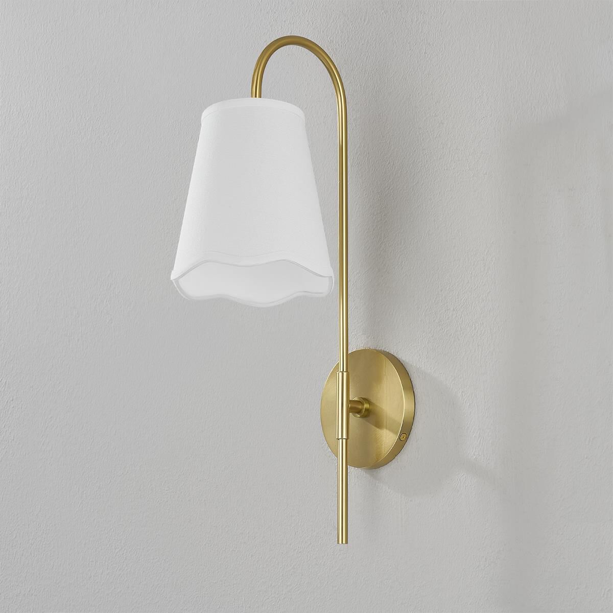 Shown in Aged Brass finish and White Linen shade