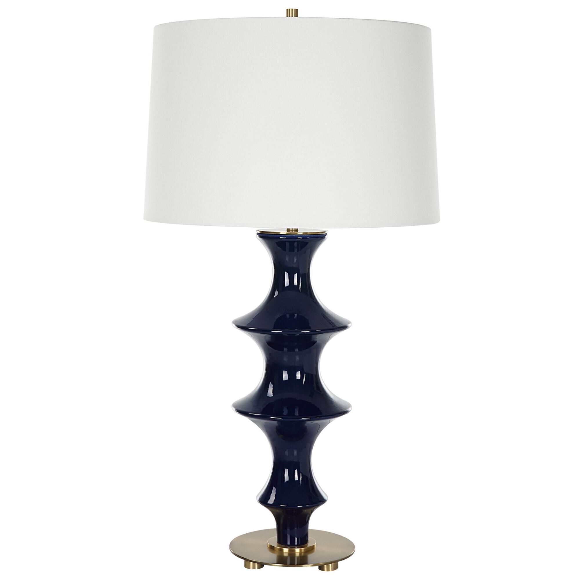 Shown in Cobalt Gloss Glaze with Antique Brass finish and Round Hardback shade