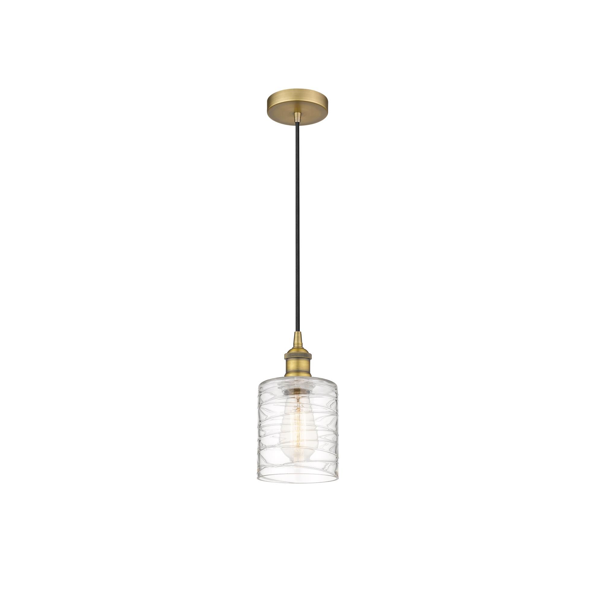 Shown in Brushed Brass finish and Deco Swirl glass