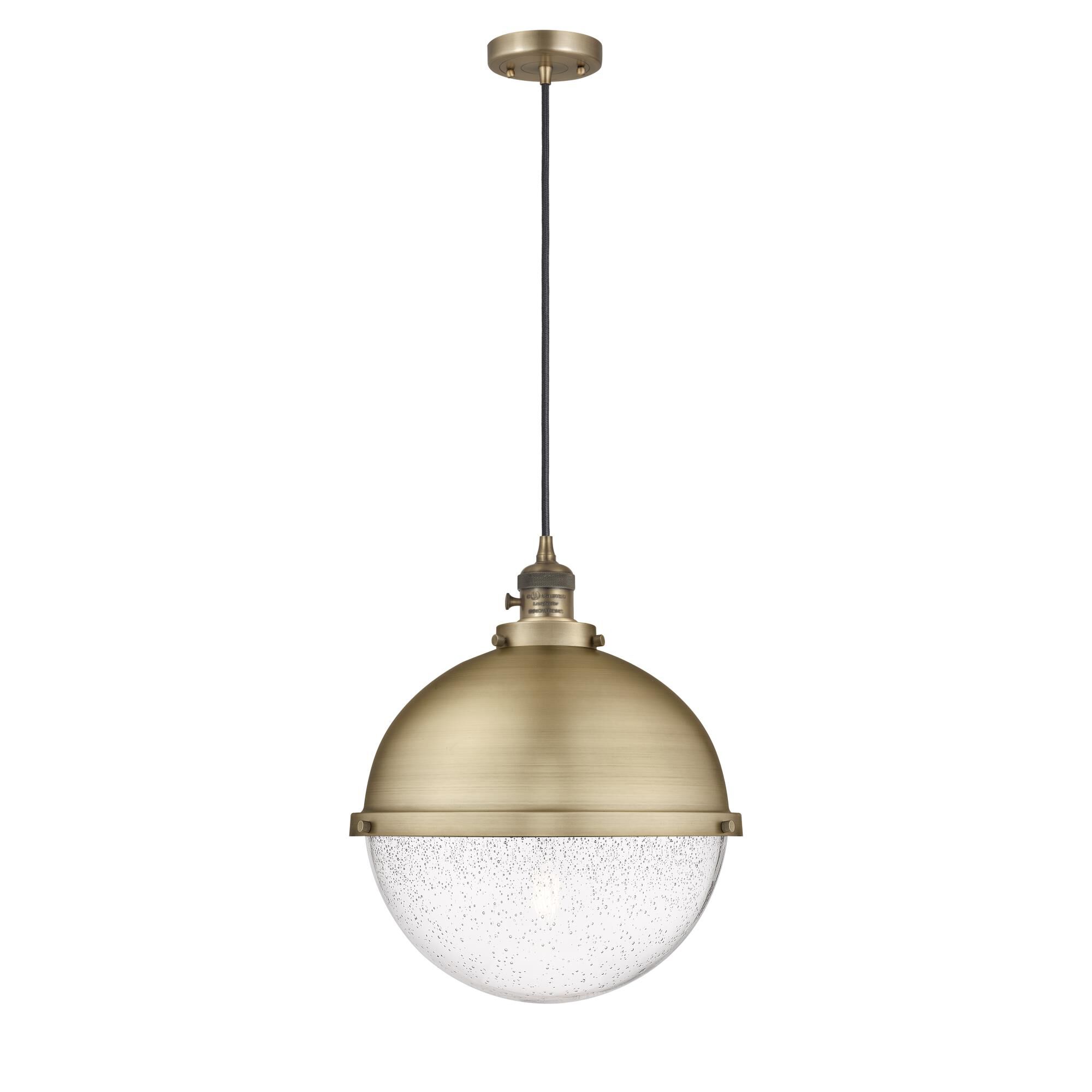Shown in Brushed Brass finish and Seedy glass