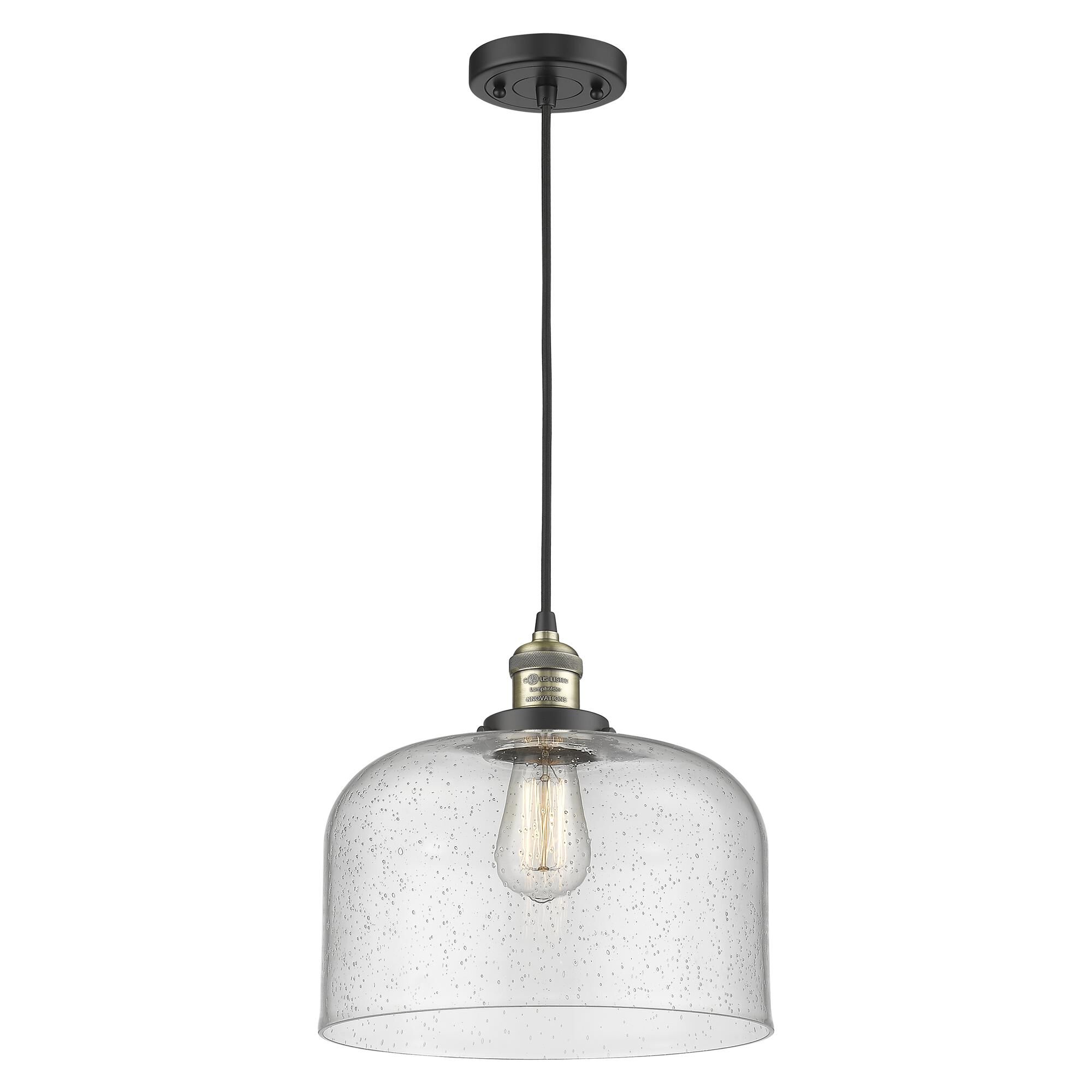 Shown in Black Antique Brass finish and Seedy glass