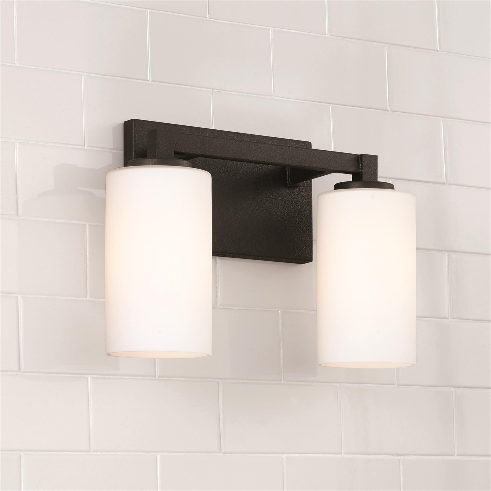 Shown in Black Iron finish and Soft White glass