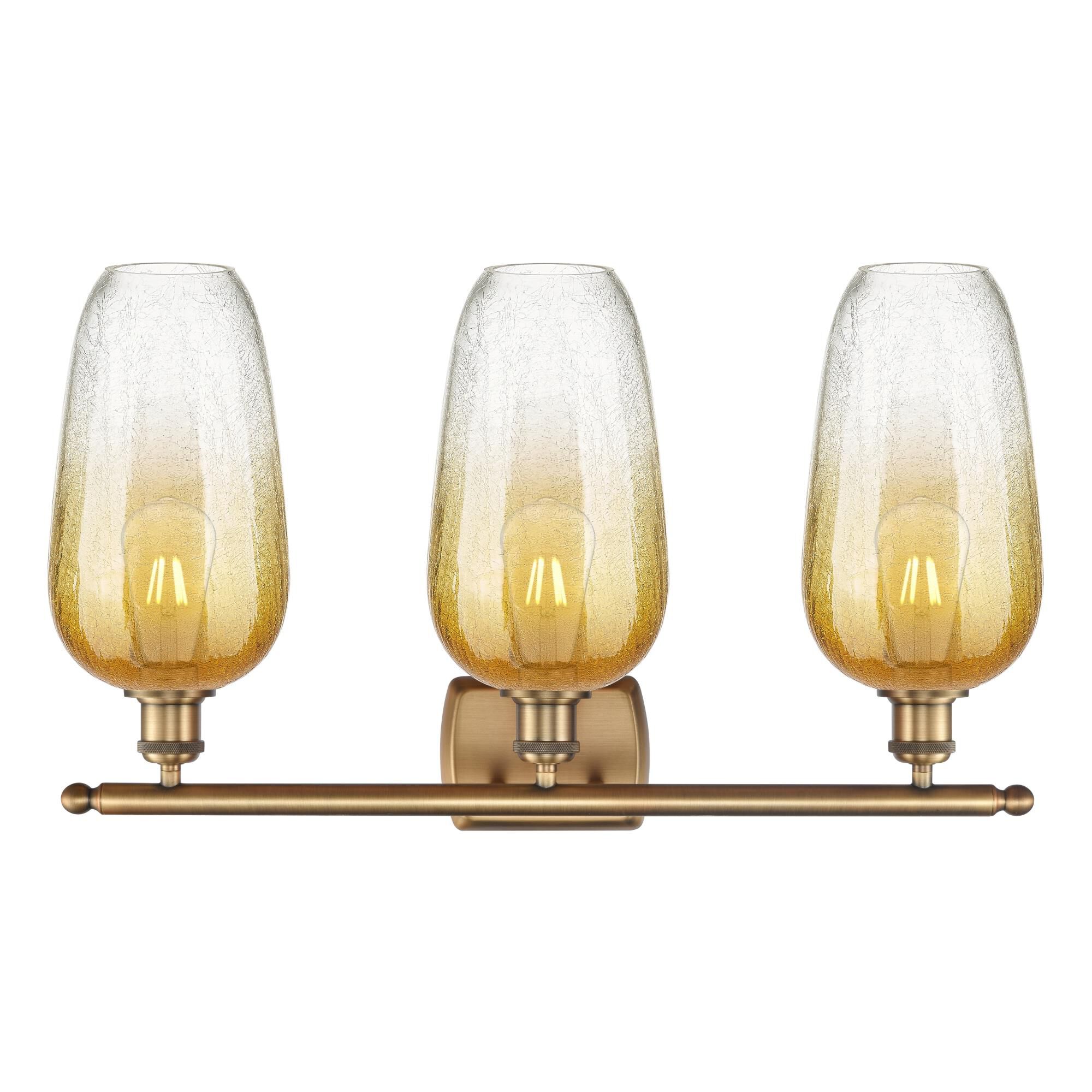 Shown in Brushed Brass finish and Amber glass