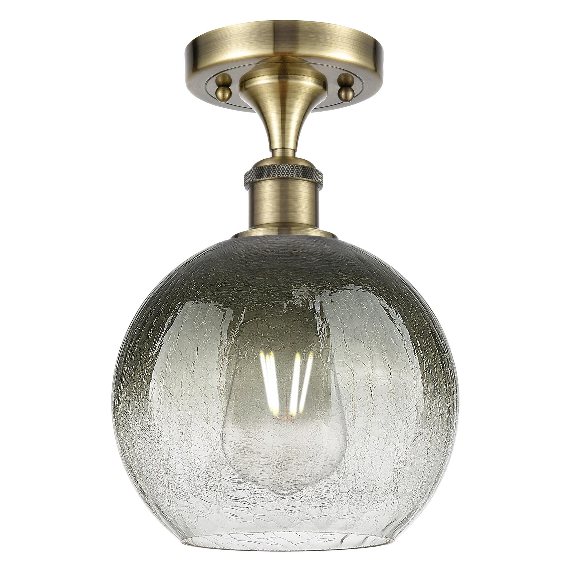 Shown in Antique Brass finish and Slate glass