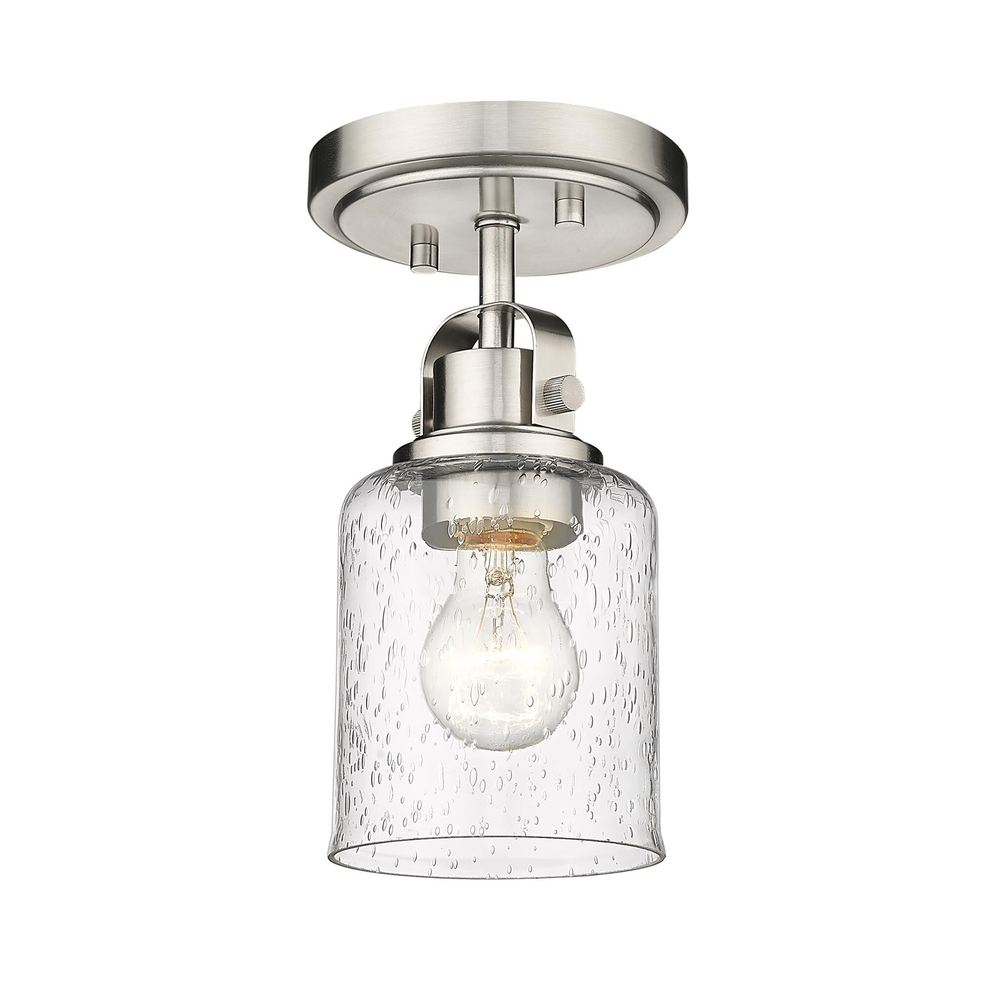 Shown in Brushed Nickel finish and Glass shade