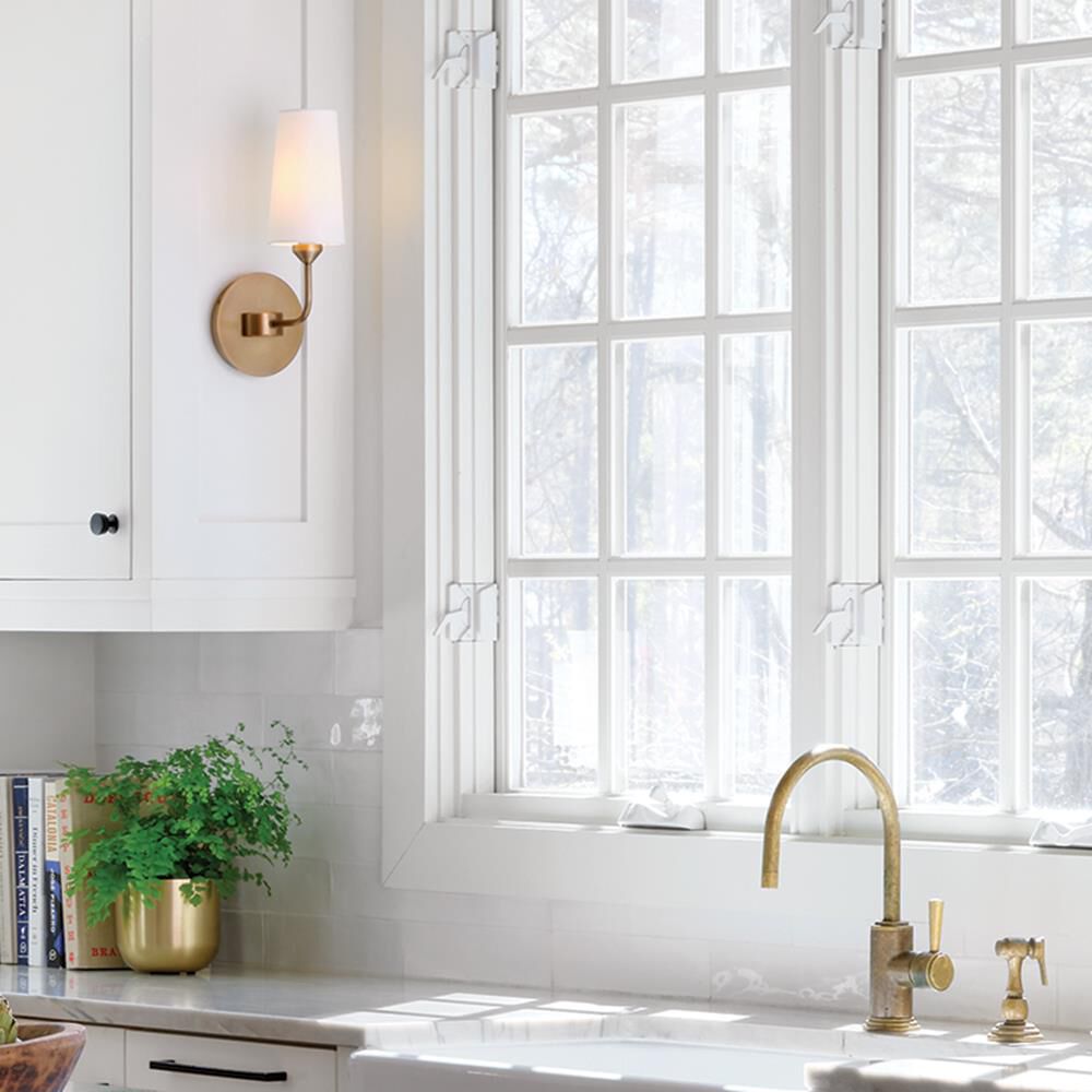 Shown in Heritage Brass finish and Natural Paper shade