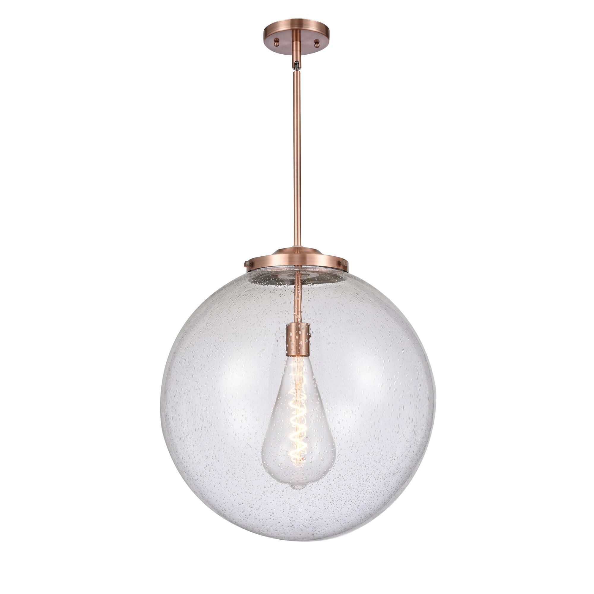Shown in Antique Copper finish and Seedy Beacon glass