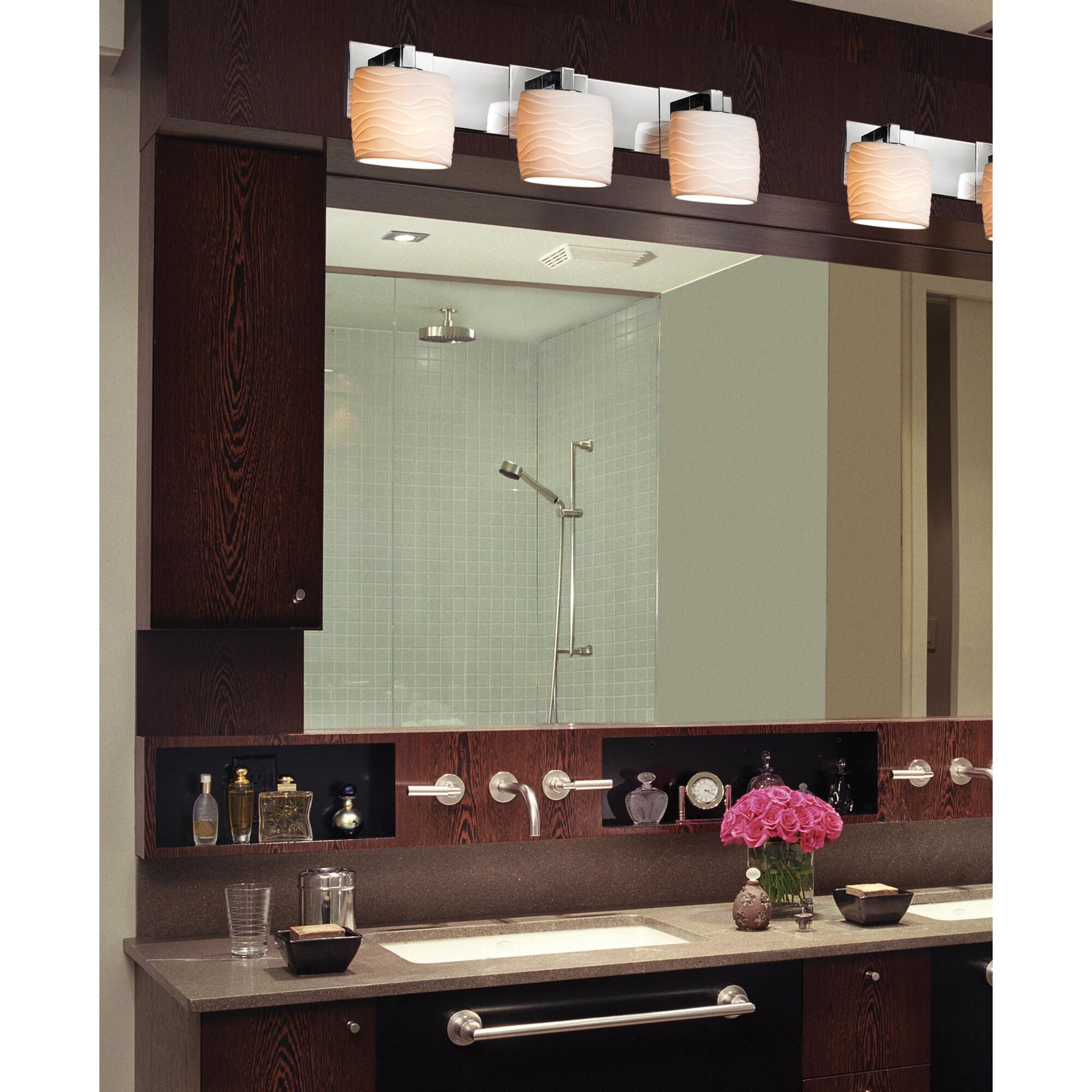 Shown in Brushed Nickel finish and Translucent Porcelain glass and Waves shade and Oval accent