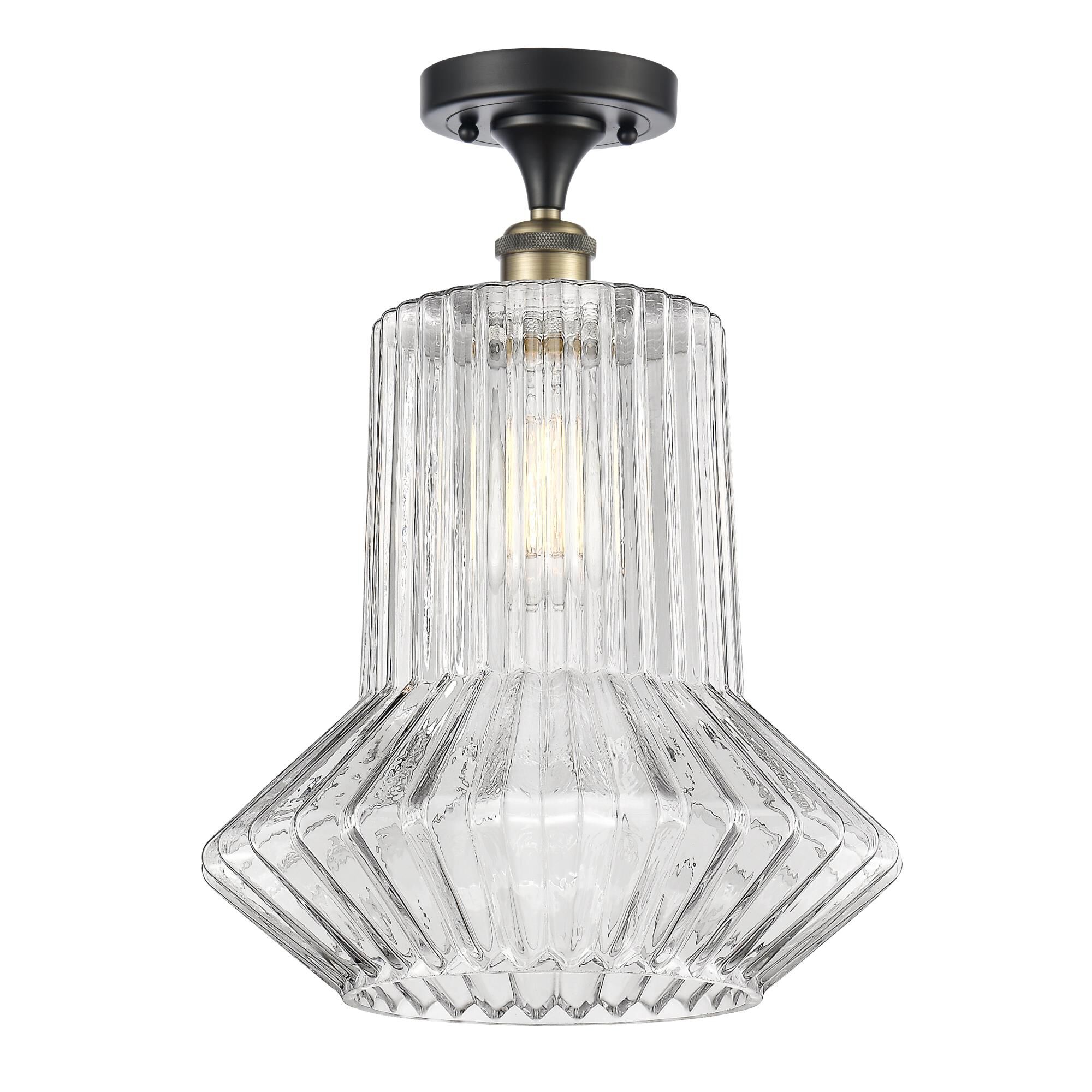 Shown in Black Antique Brass finish and Novelty glass and Glass shade