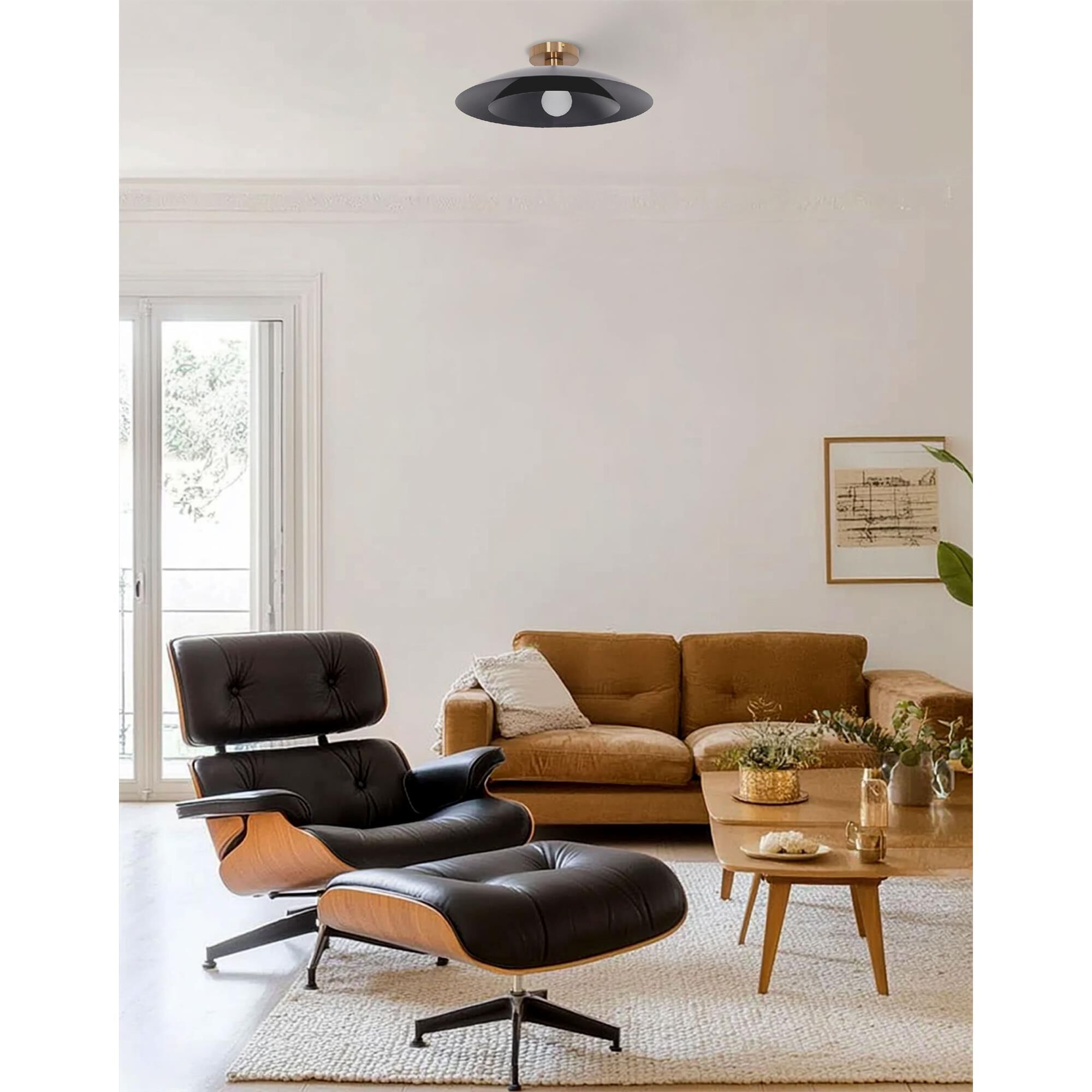 Shown in Aged Brass finish and Matte Black shade