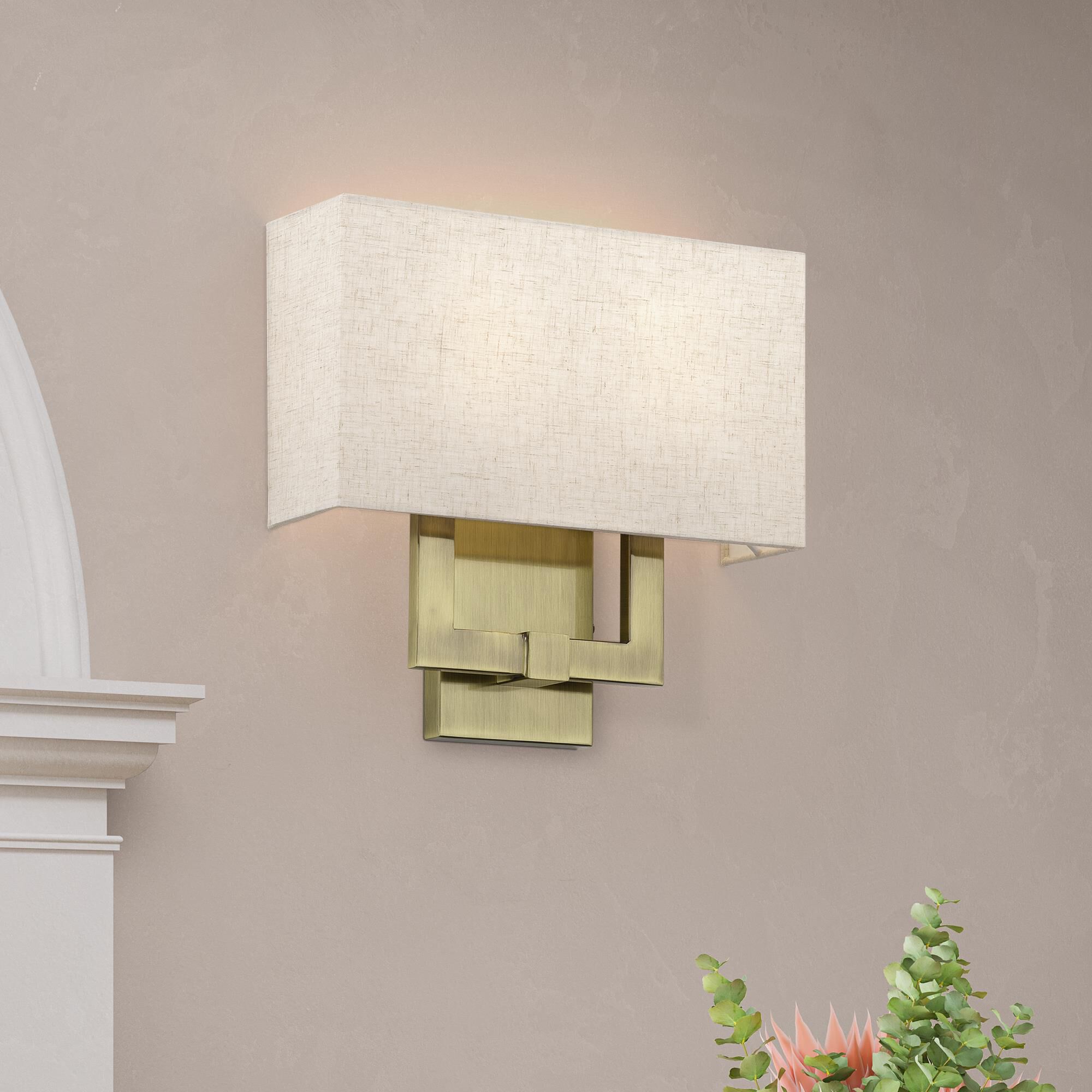 Shown in Antique Brass finish and Hand Crafted Oatmeal Color Fabric with White Color Inside shade