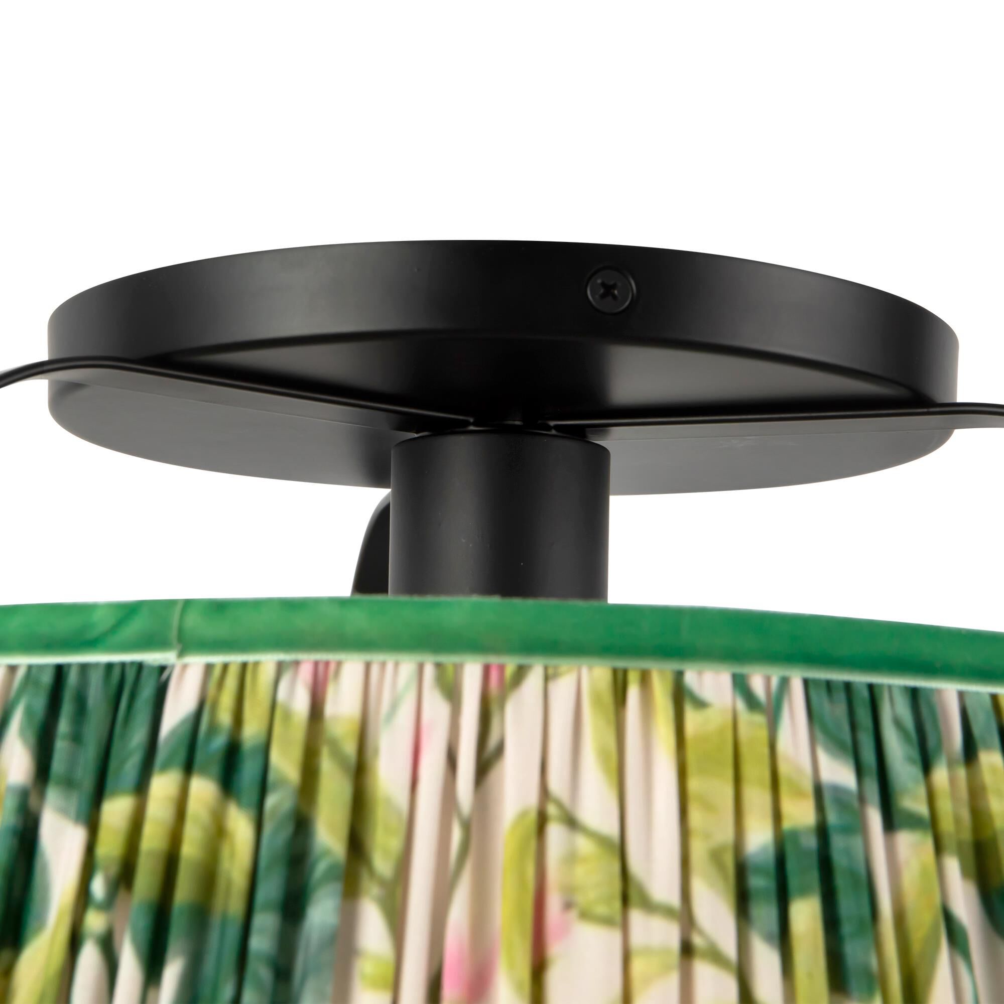 Shown in Matte Black finish and Frosted Polycarbonate Diffuser glass and Green Linen shade