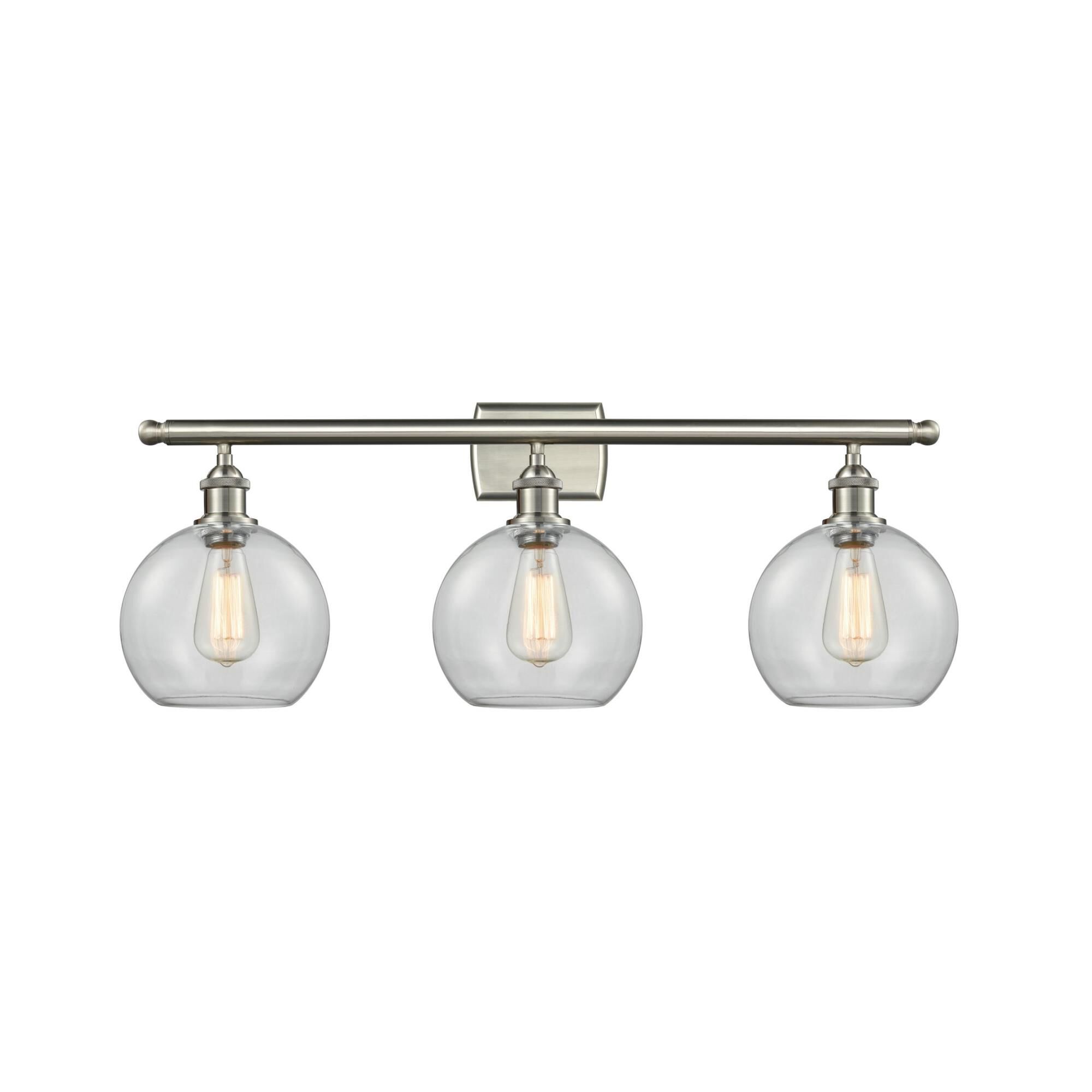 Shown in Brushed Satin Nickel finish and Clear Globe glass