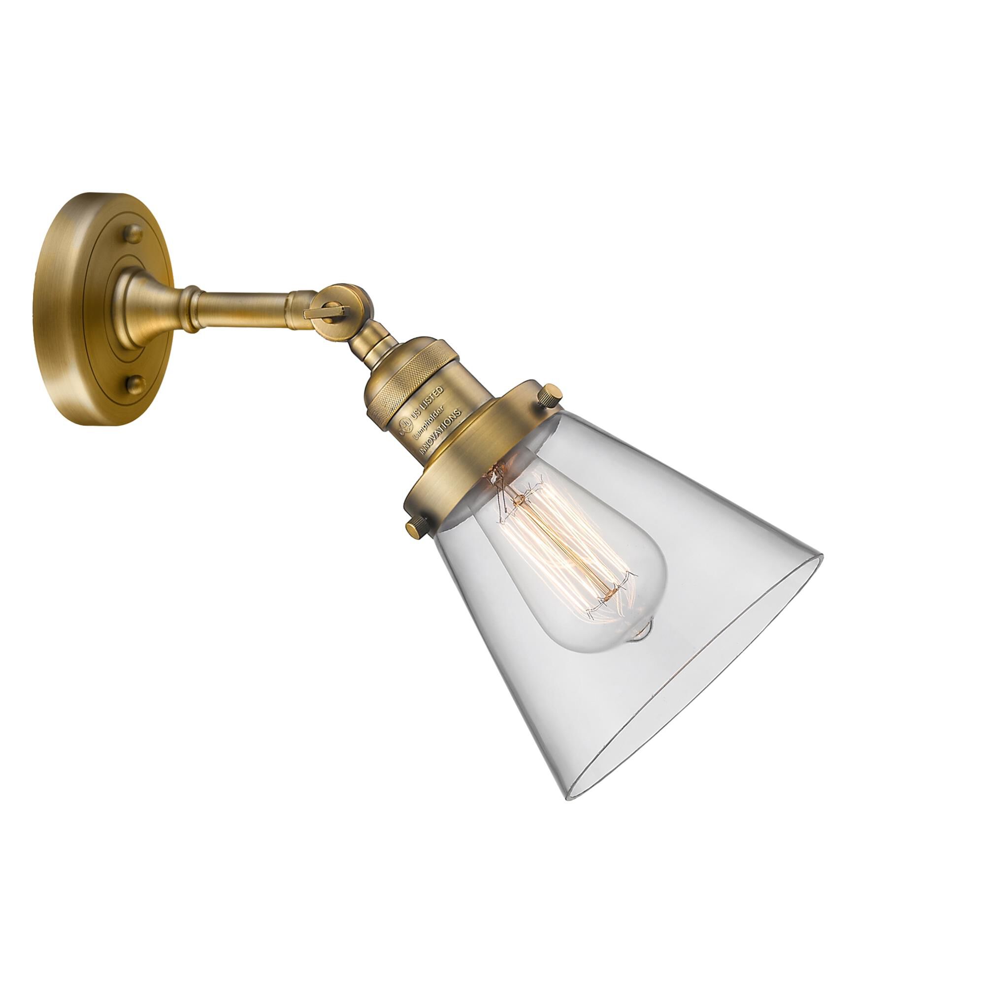 Shown in Brushed Brass finish and Clear glass and None accent
