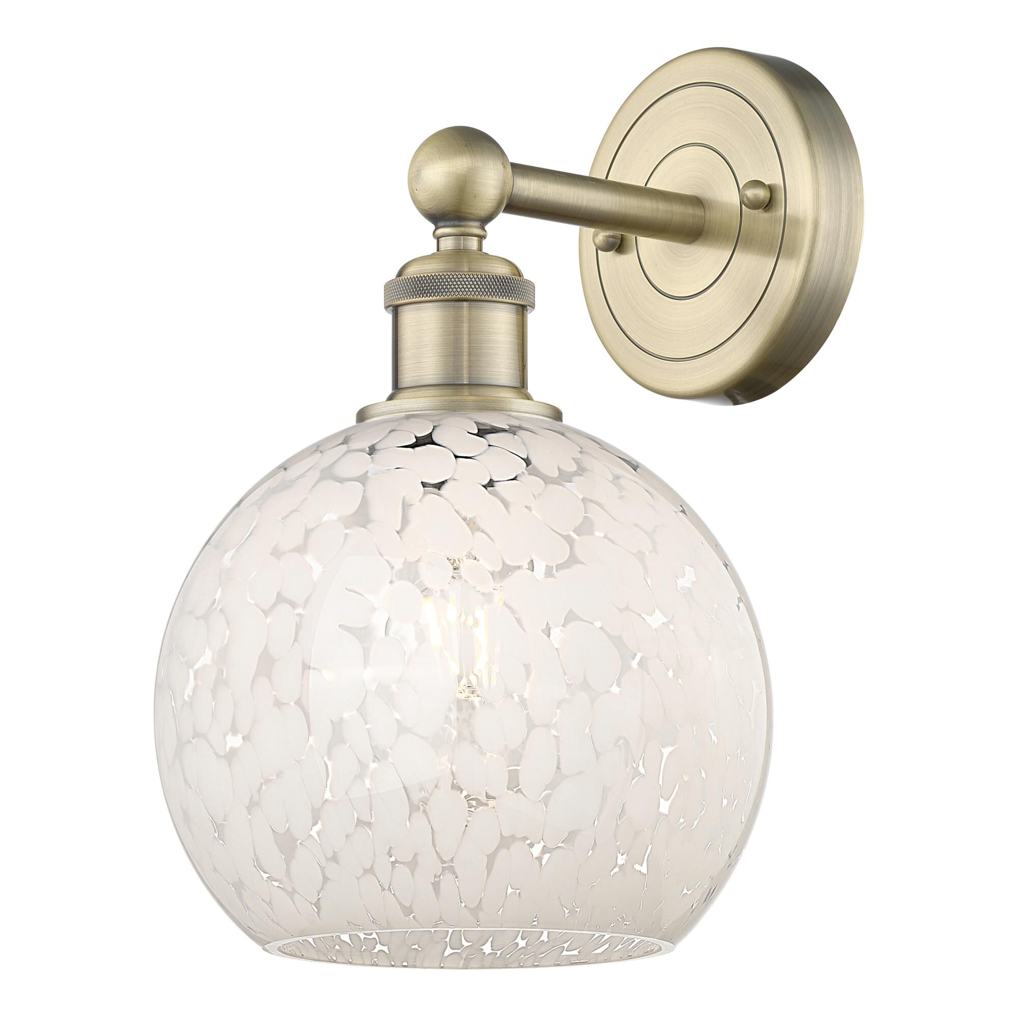 Shown in Antique Brass finish and White Mouchette glass