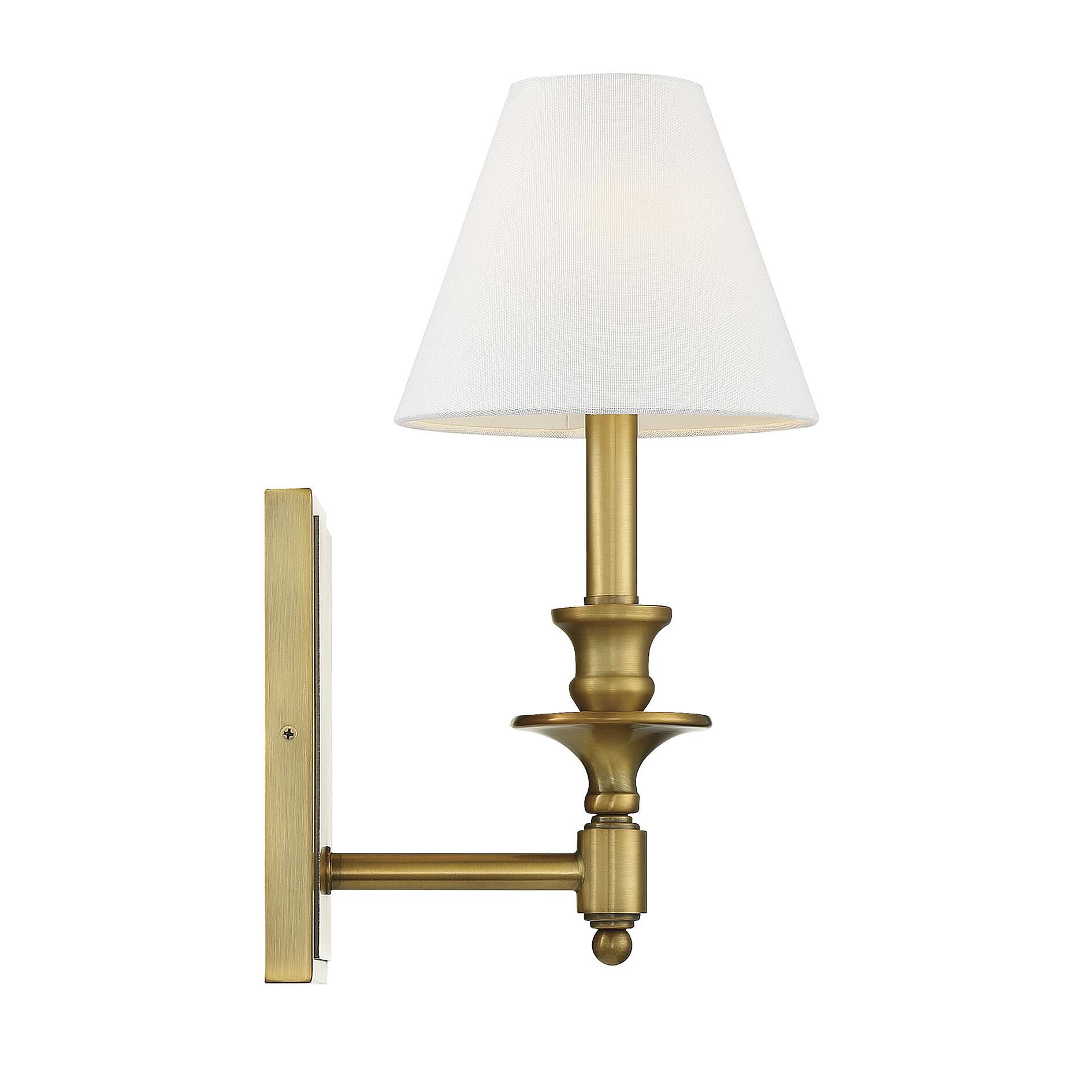Shown in Warm Brass finish and White Linen shade