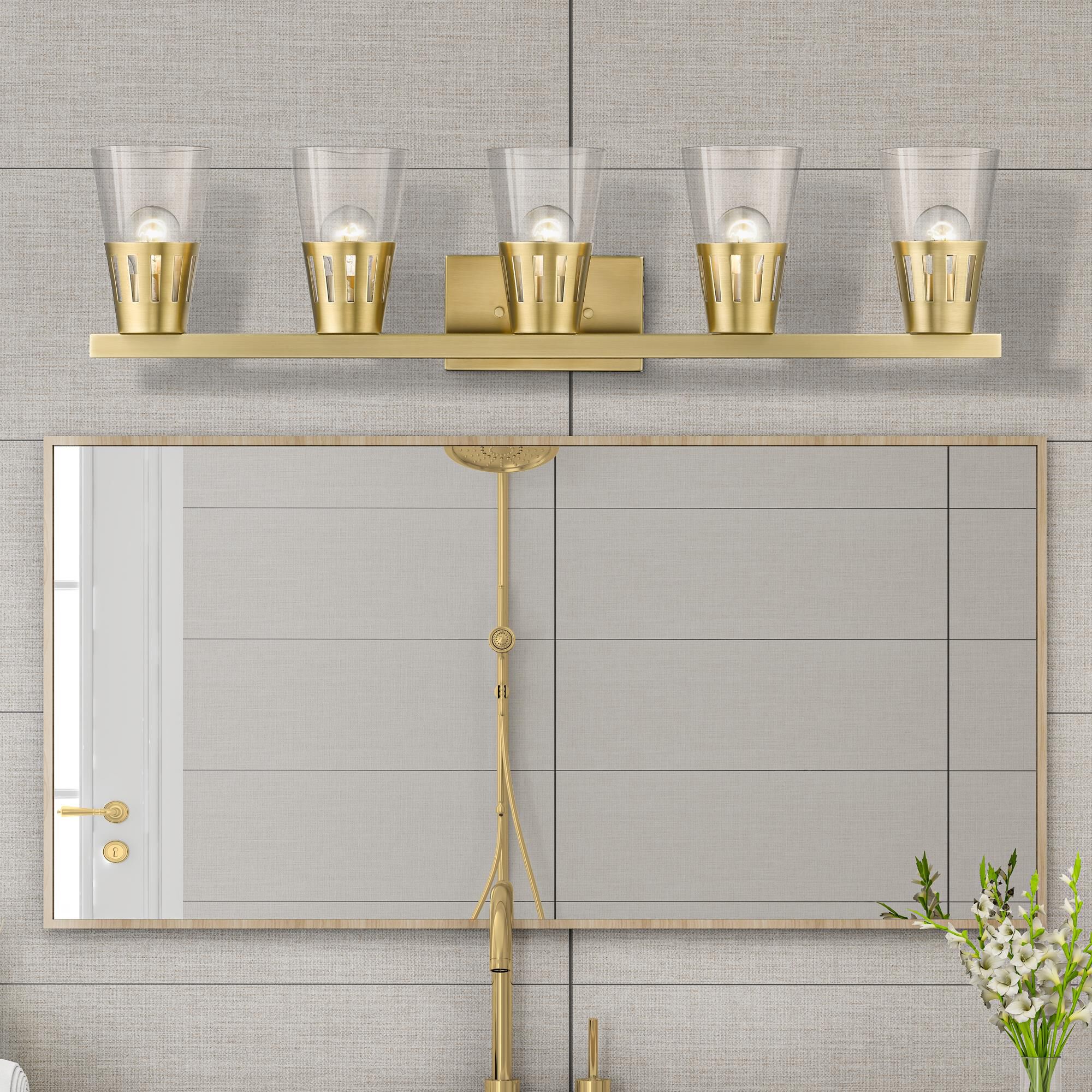 Shown in Natural Brass finish and Hand Blown Clear glass