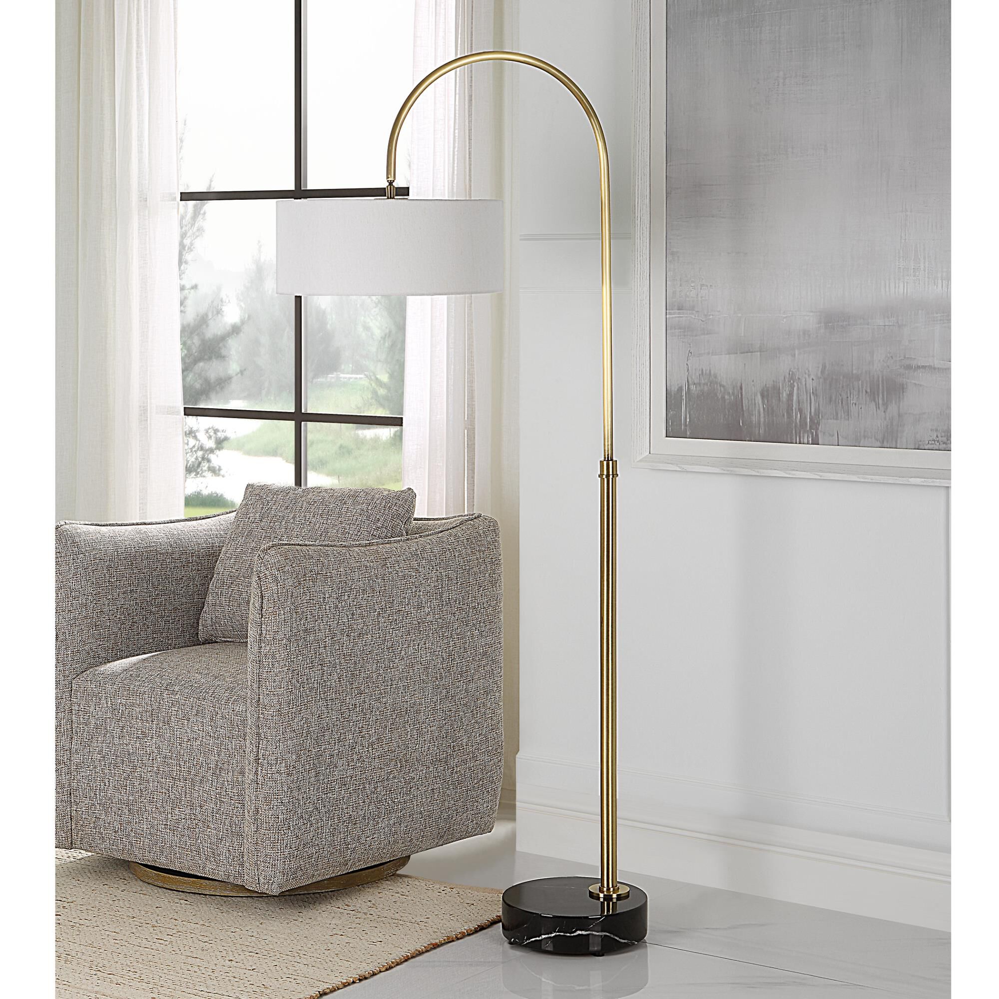 Shown in Antique Brushed Brass finish and Round Drum Hardback shade