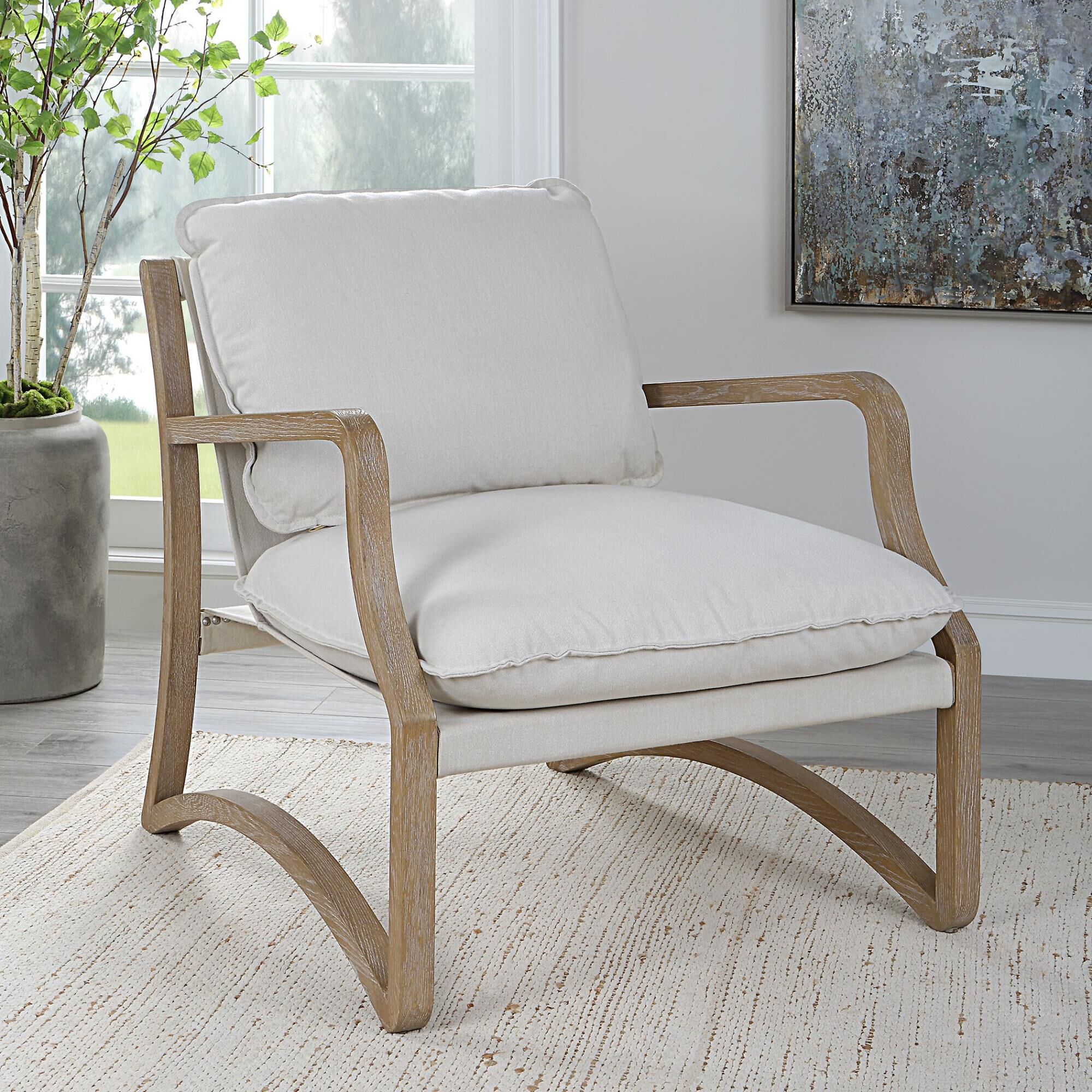Shown in Modern Yet Casual, This Stylish Accent Chair Boasts A Sculptural Open Frame Made From Solid Oak In A finish