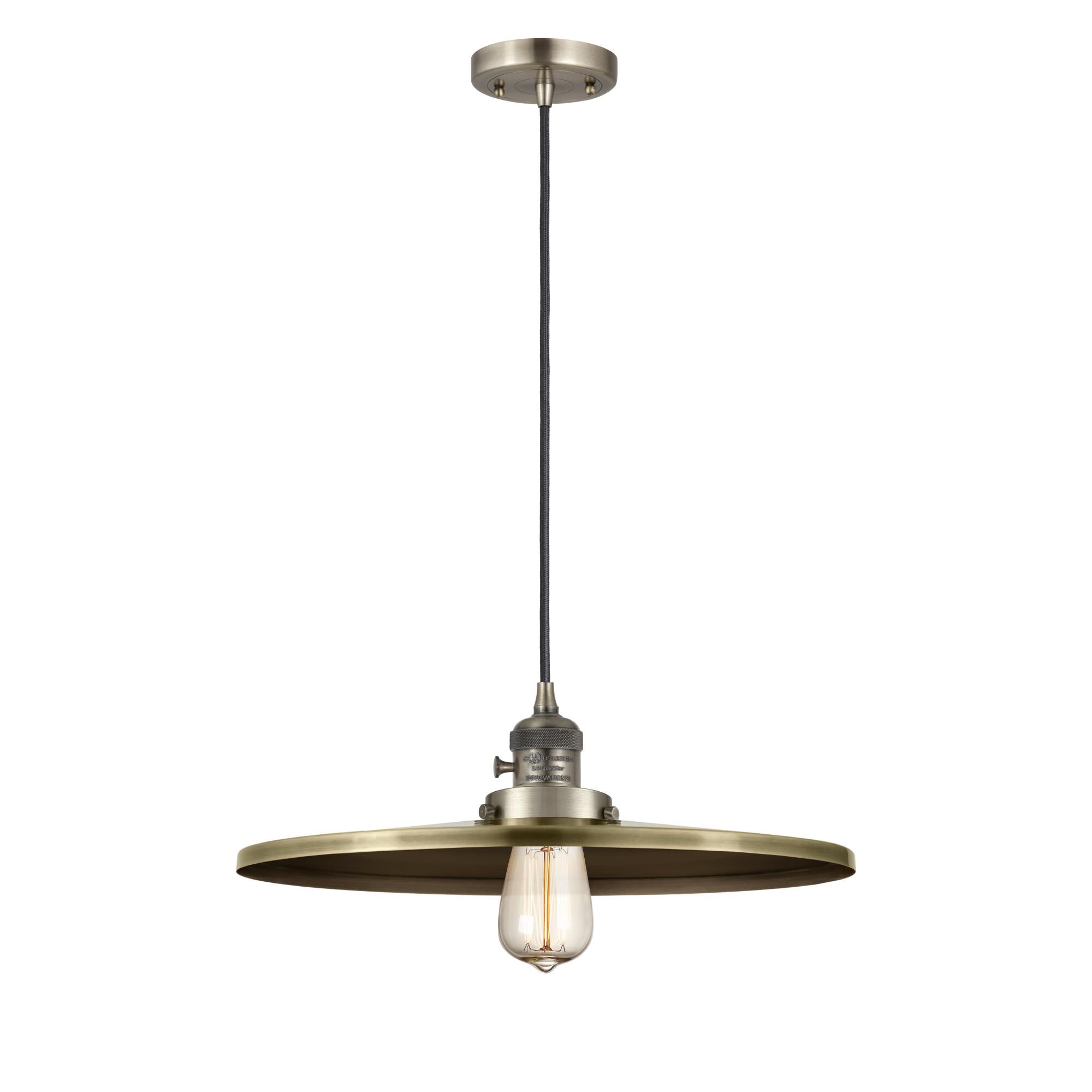 Shown in Antique Brass finish and Antique Brass shade