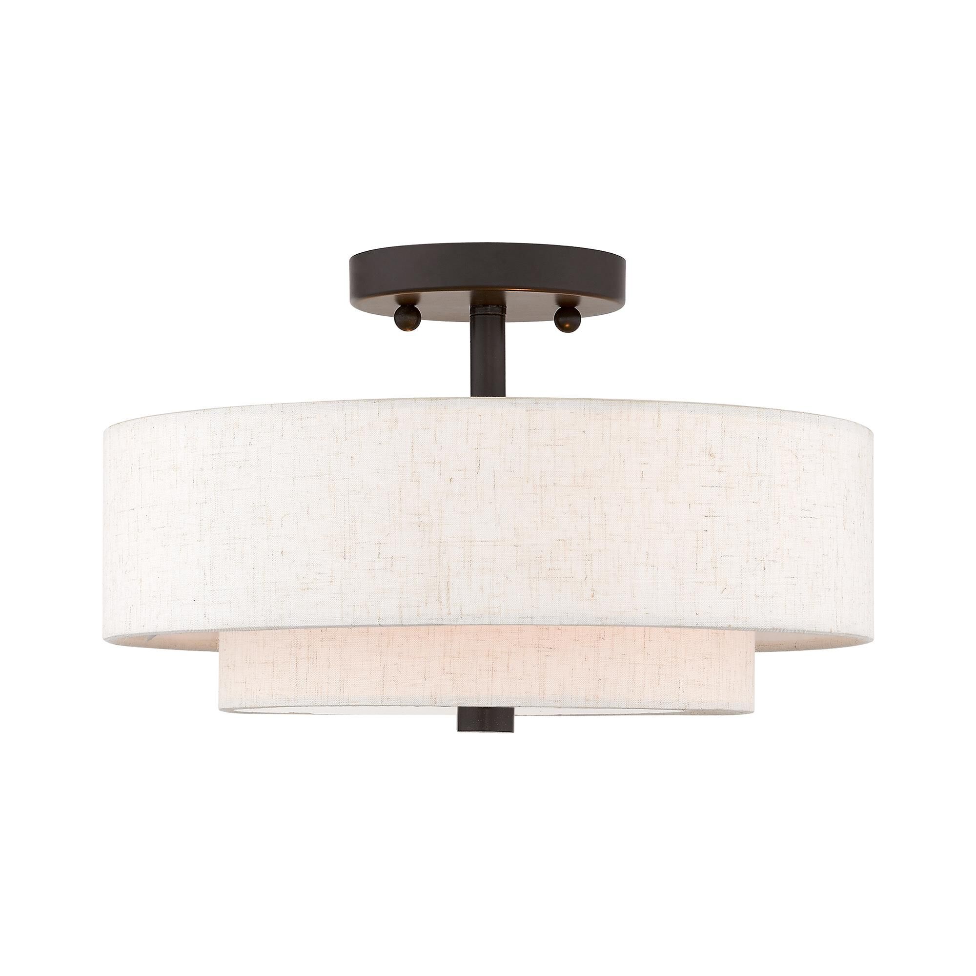 Shown in English Bronze finish and Hand Crafted Oatmeal Color Fabric Outside & White Fabric Inside Hardback shade